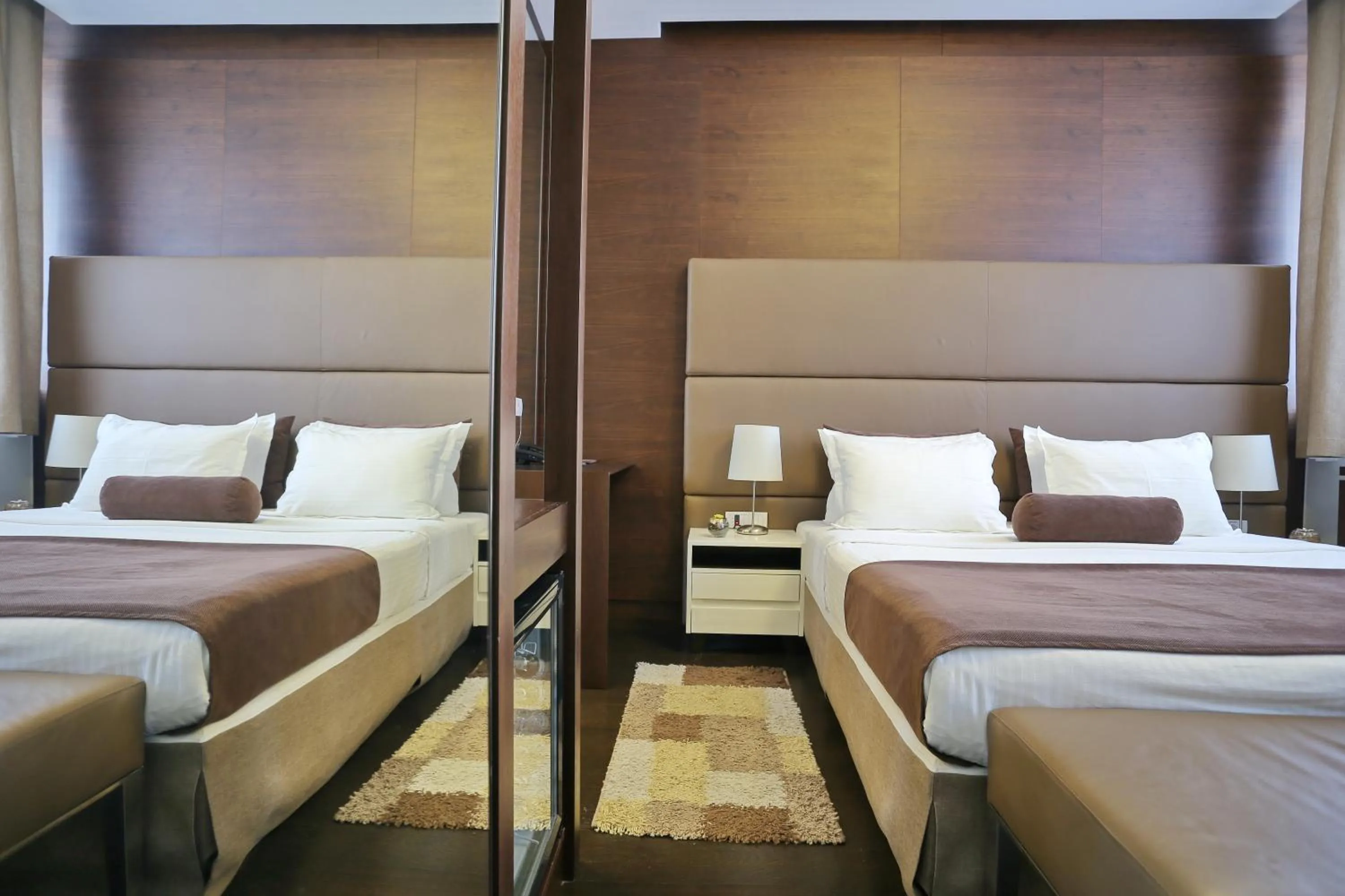 Bed in Belgreat Premium Suites