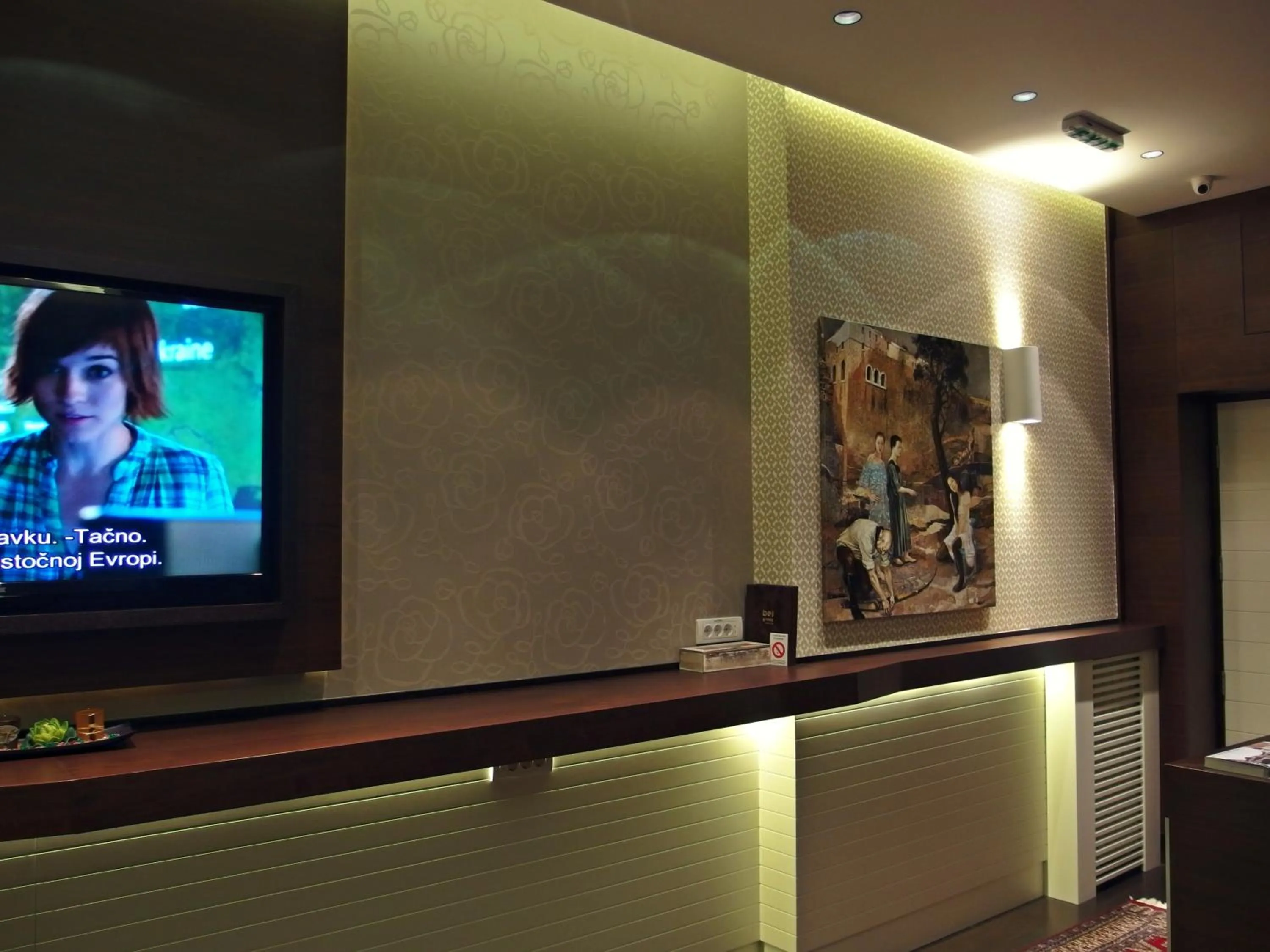 Communal lounge/ TV room in Belgreat Premium Suites