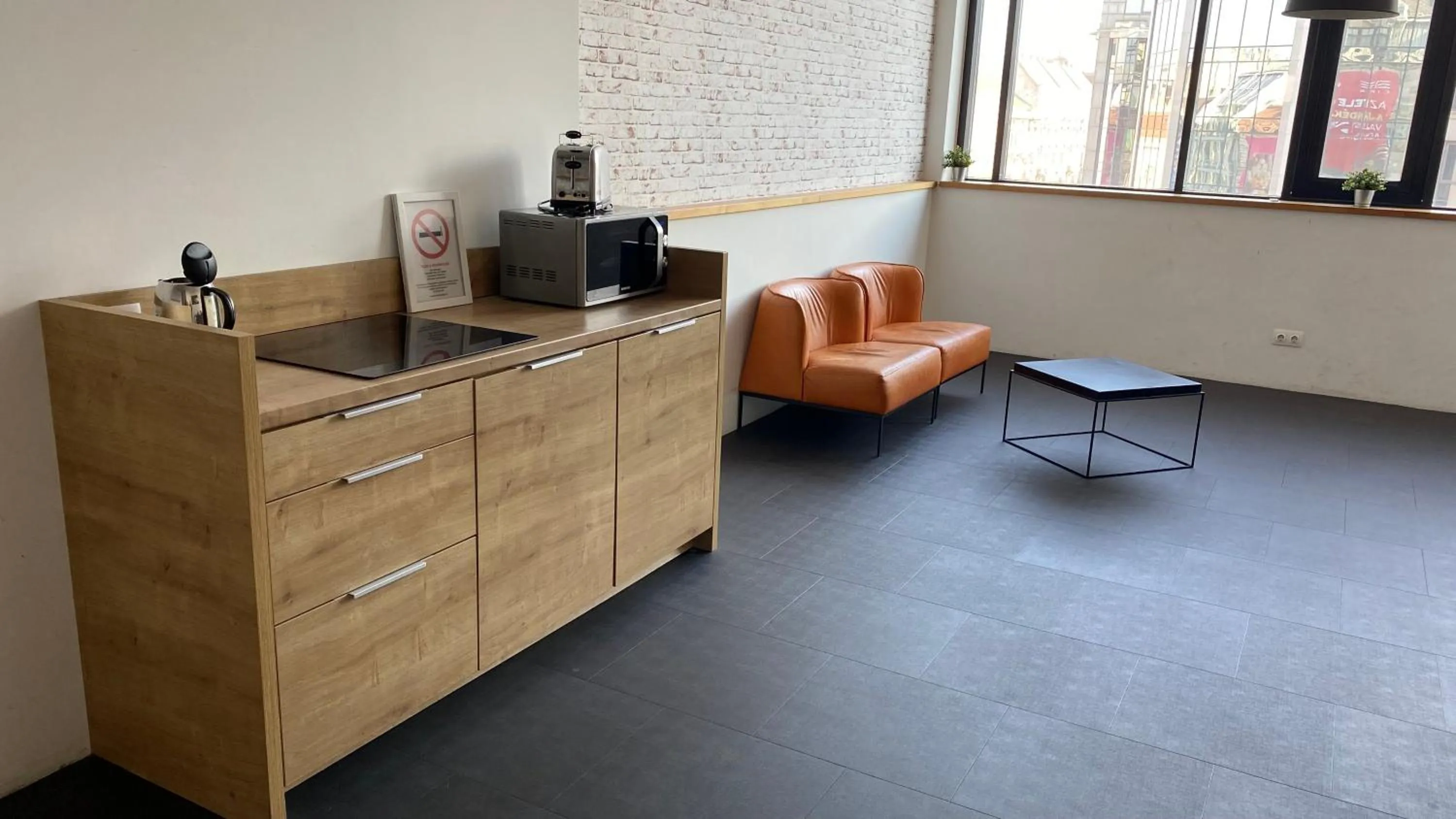 kitchen in LOFT Astoria Suites by Vagabond