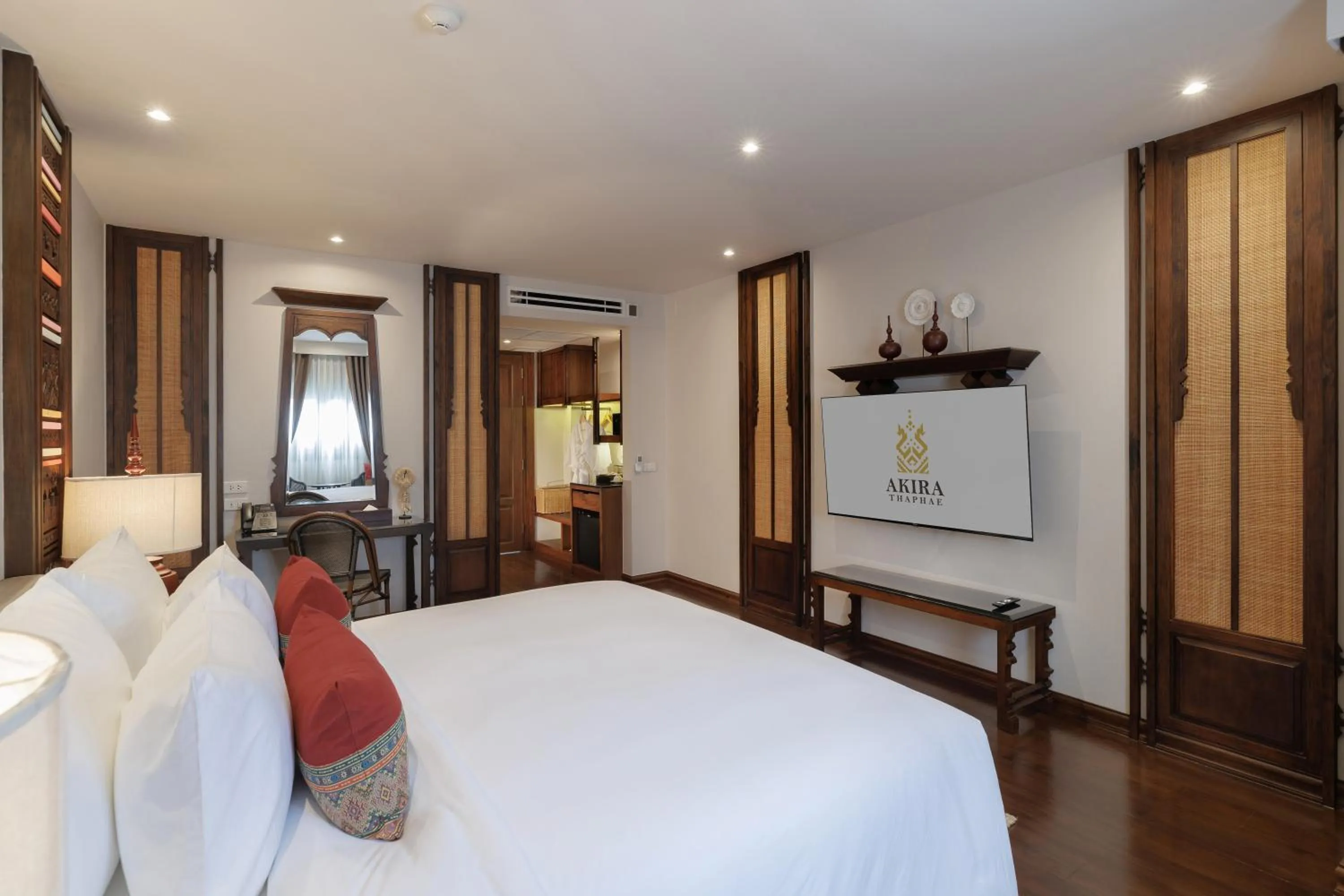 Bed in Akira Thaphae Hotel