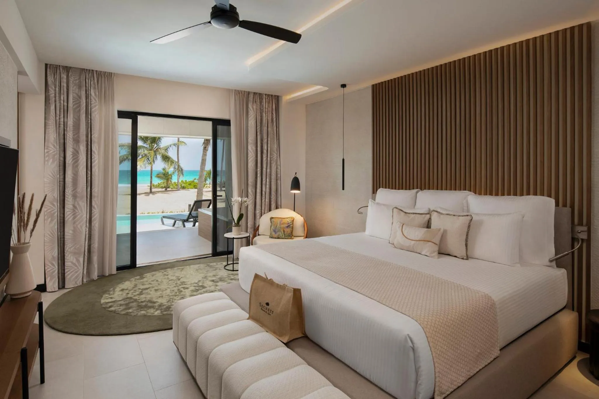 Bed in Secrets Playa Esmeralda Resort & Spa - All Inclusive