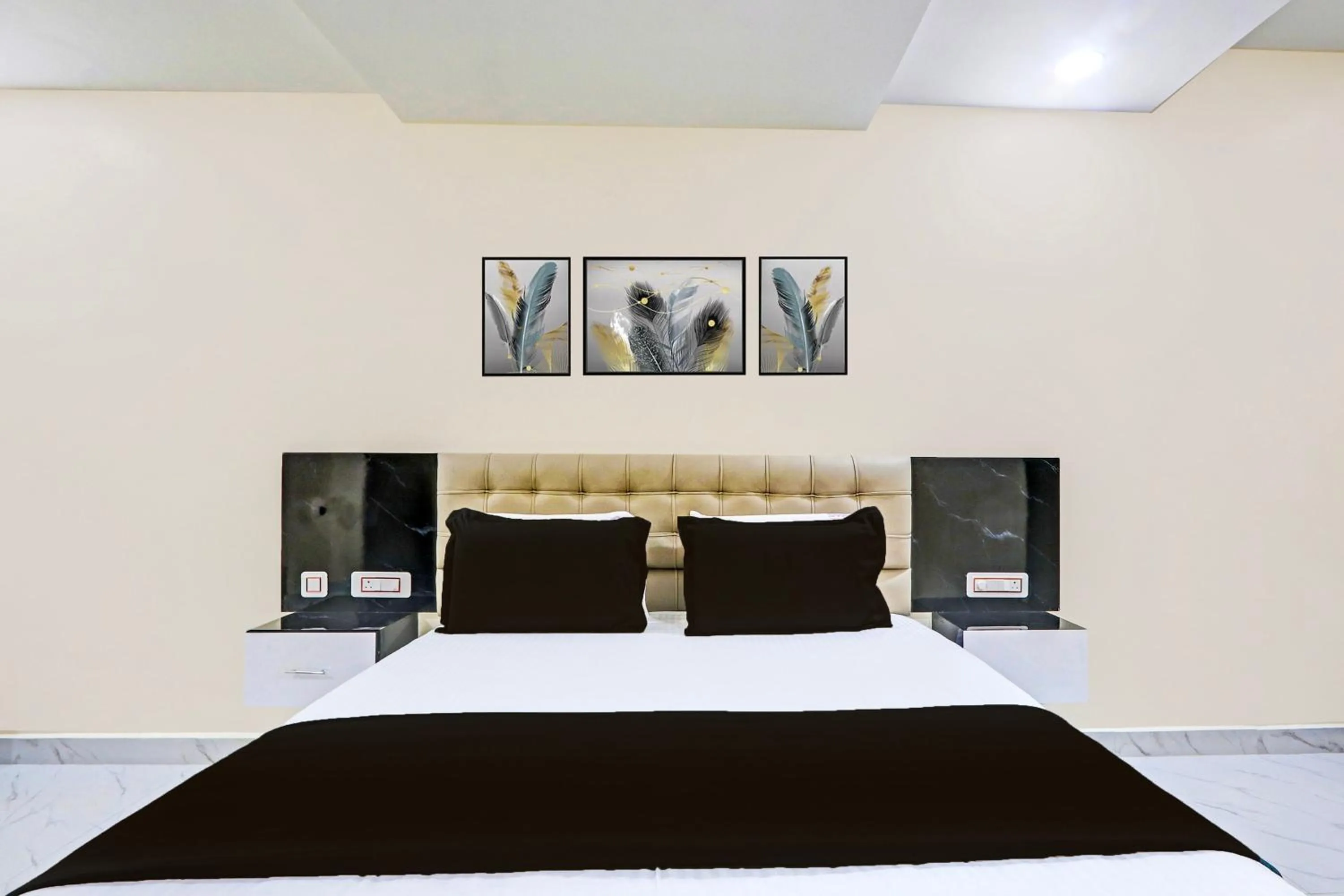 Bedroom in Super Hotel O SRI VISHNU RESIDENCY