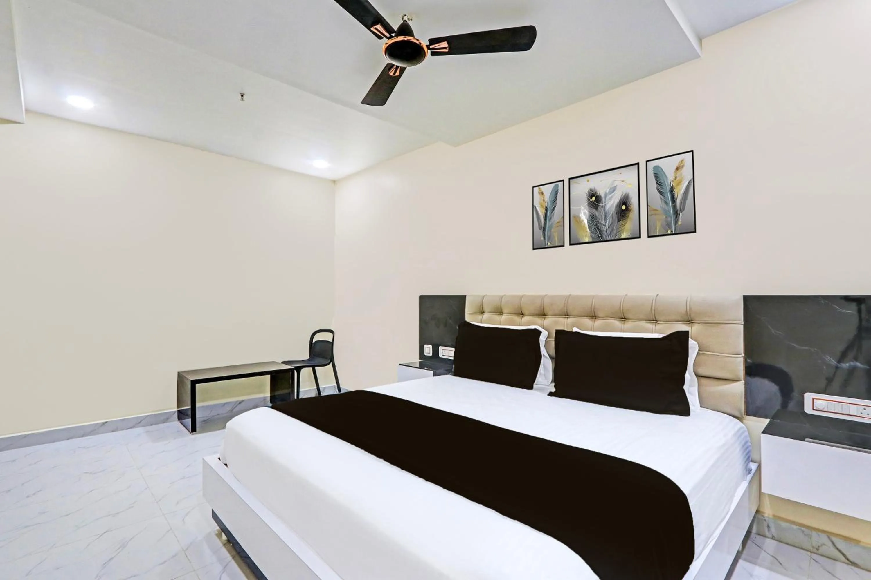 Bedroom in Super Hotel O SRI VISHNU RESIDENCY