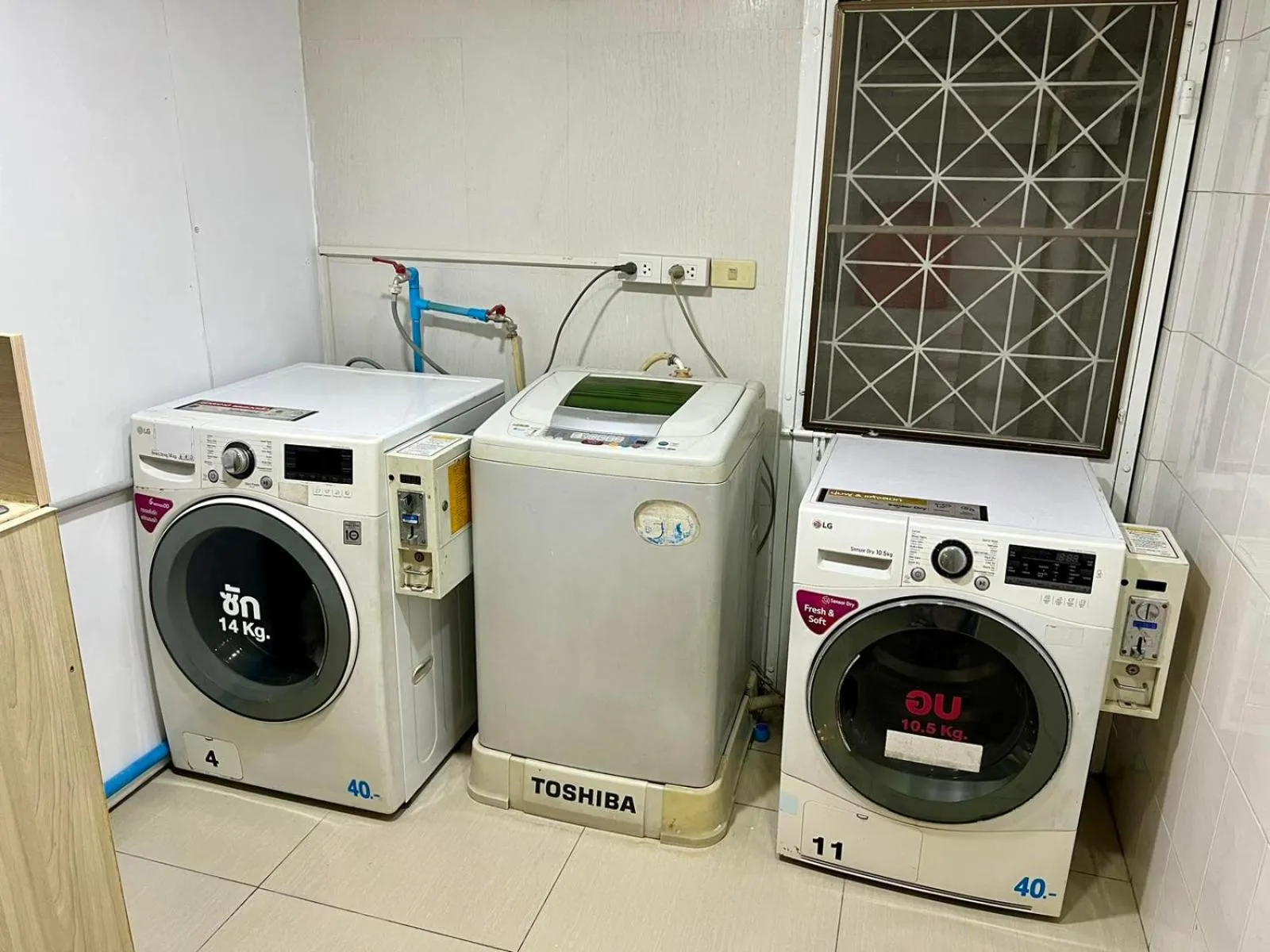 washing machine in Comfy Crib Hostel 2