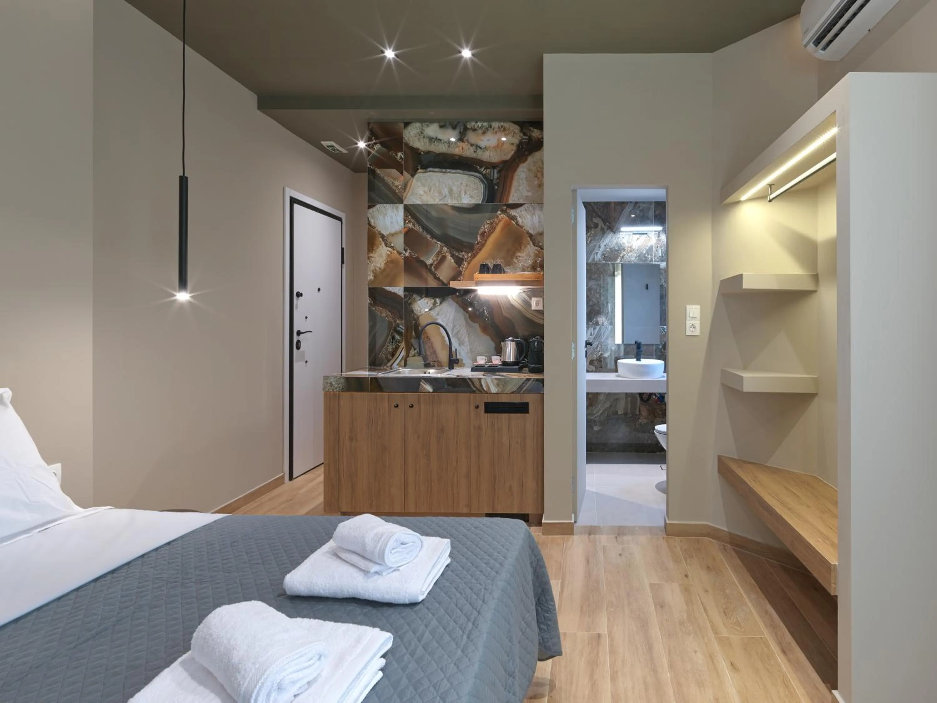 Photo of the whole room, Bed in YaPe Coastal Suites at Alimos Beach