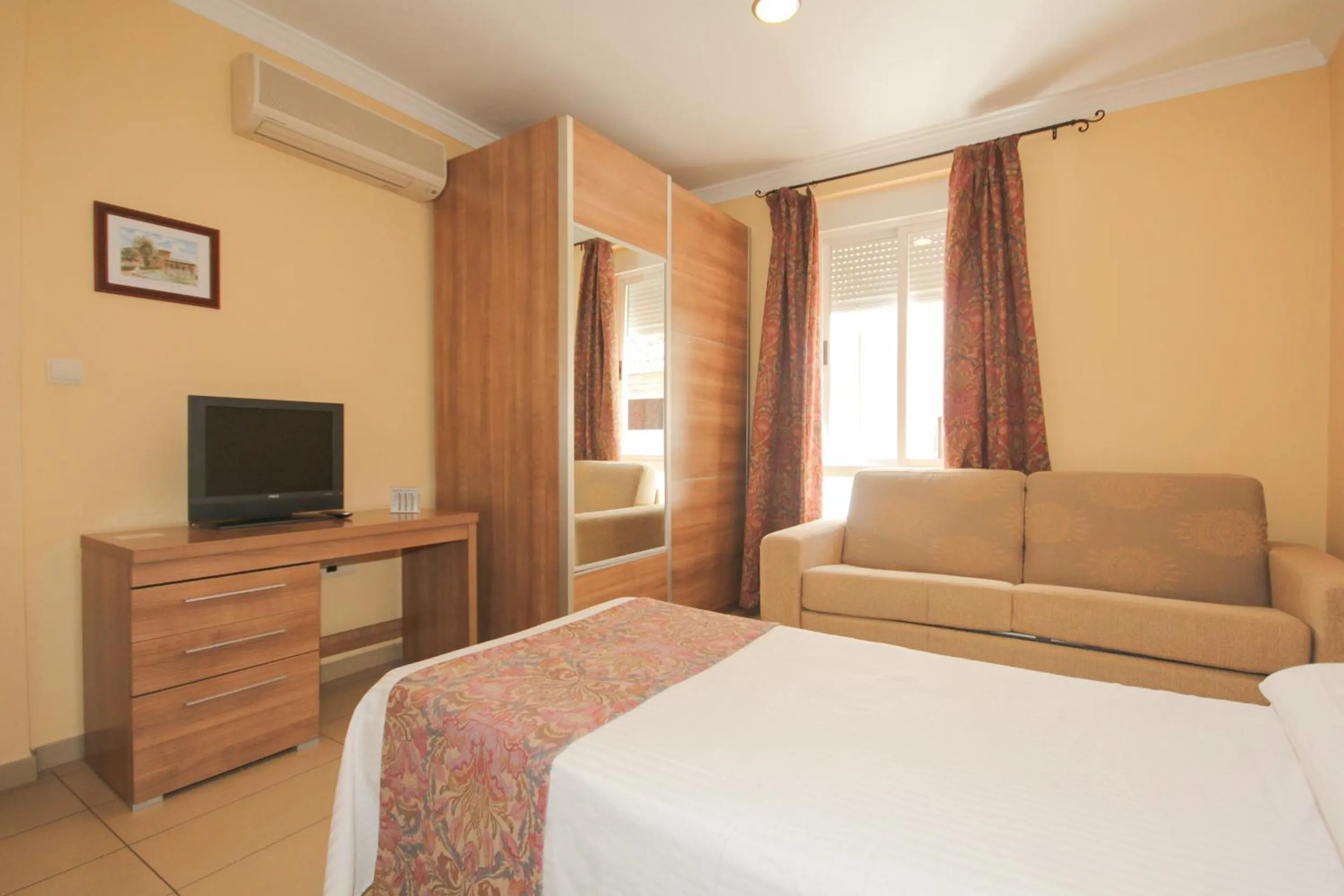 Photo of the whole room, Bed in Hostal Costa Azul