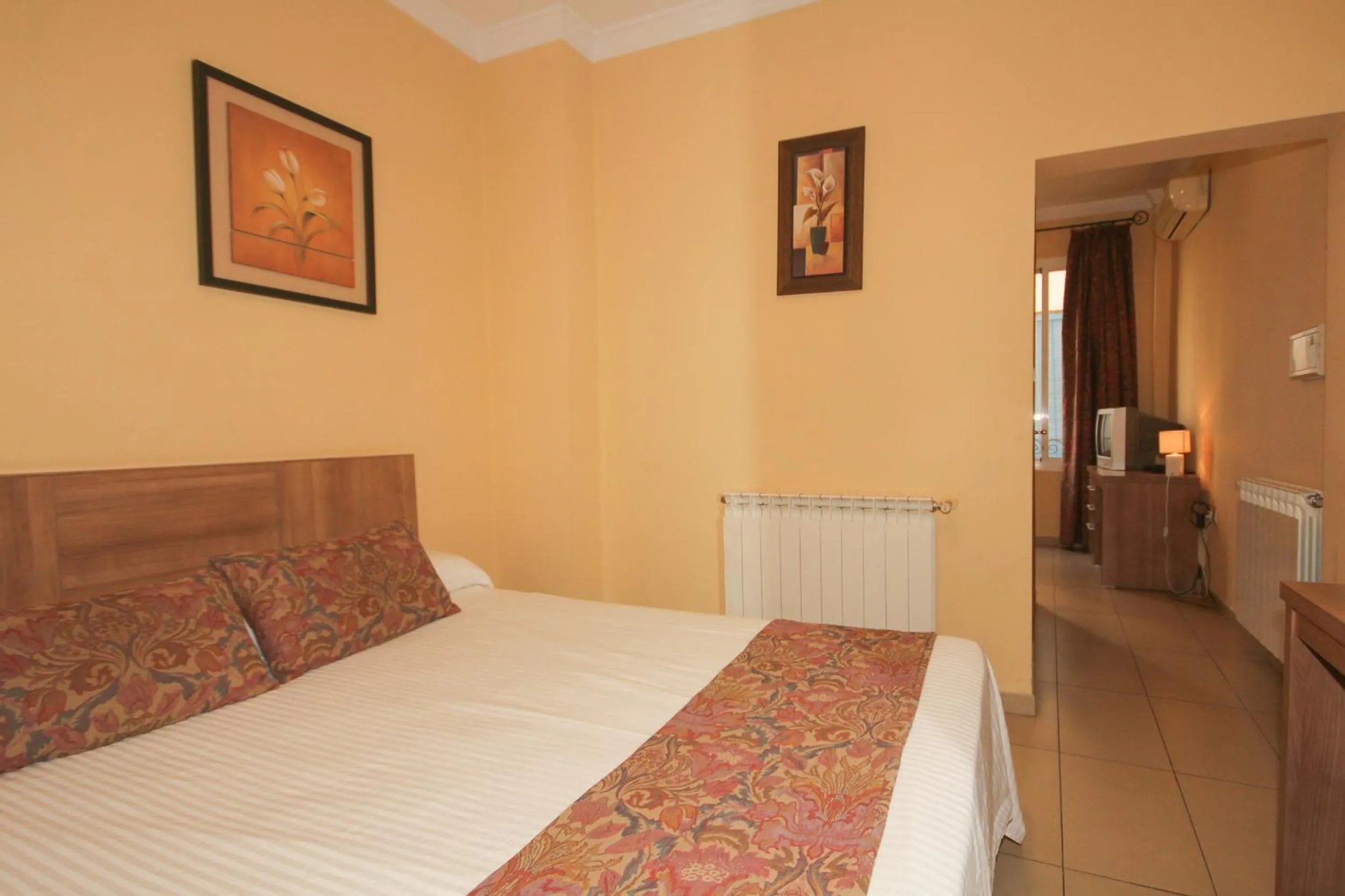 Photo of the whole room, Bed in Hostal Costa Azul