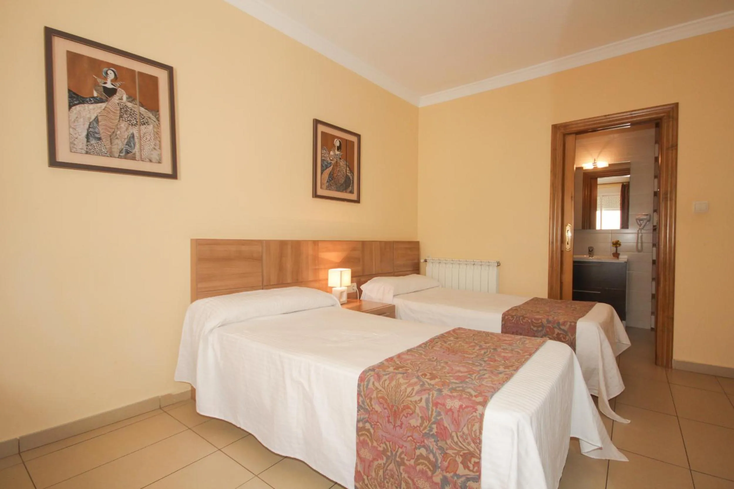 Photo of the whole room, Bed in Hostal Costa Azul