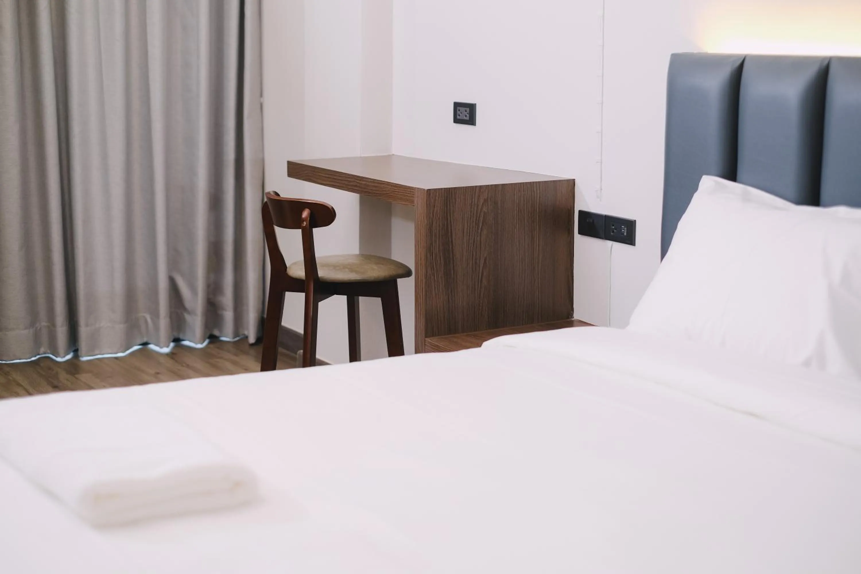 Seating area, Bed in Raya Hotel Krabi