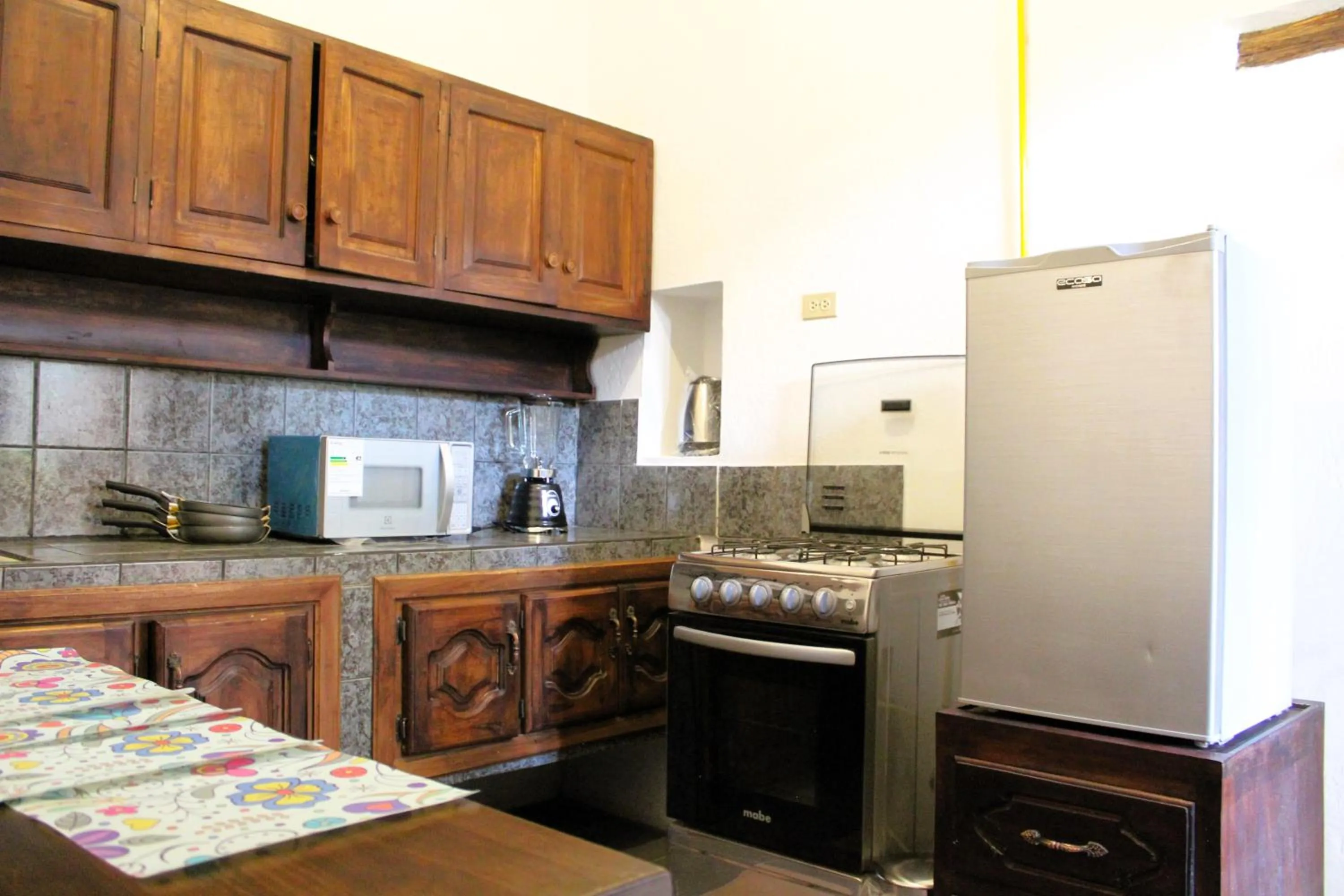 Kitchen or kitchenette in Apart Hotel Loma Chica Quito