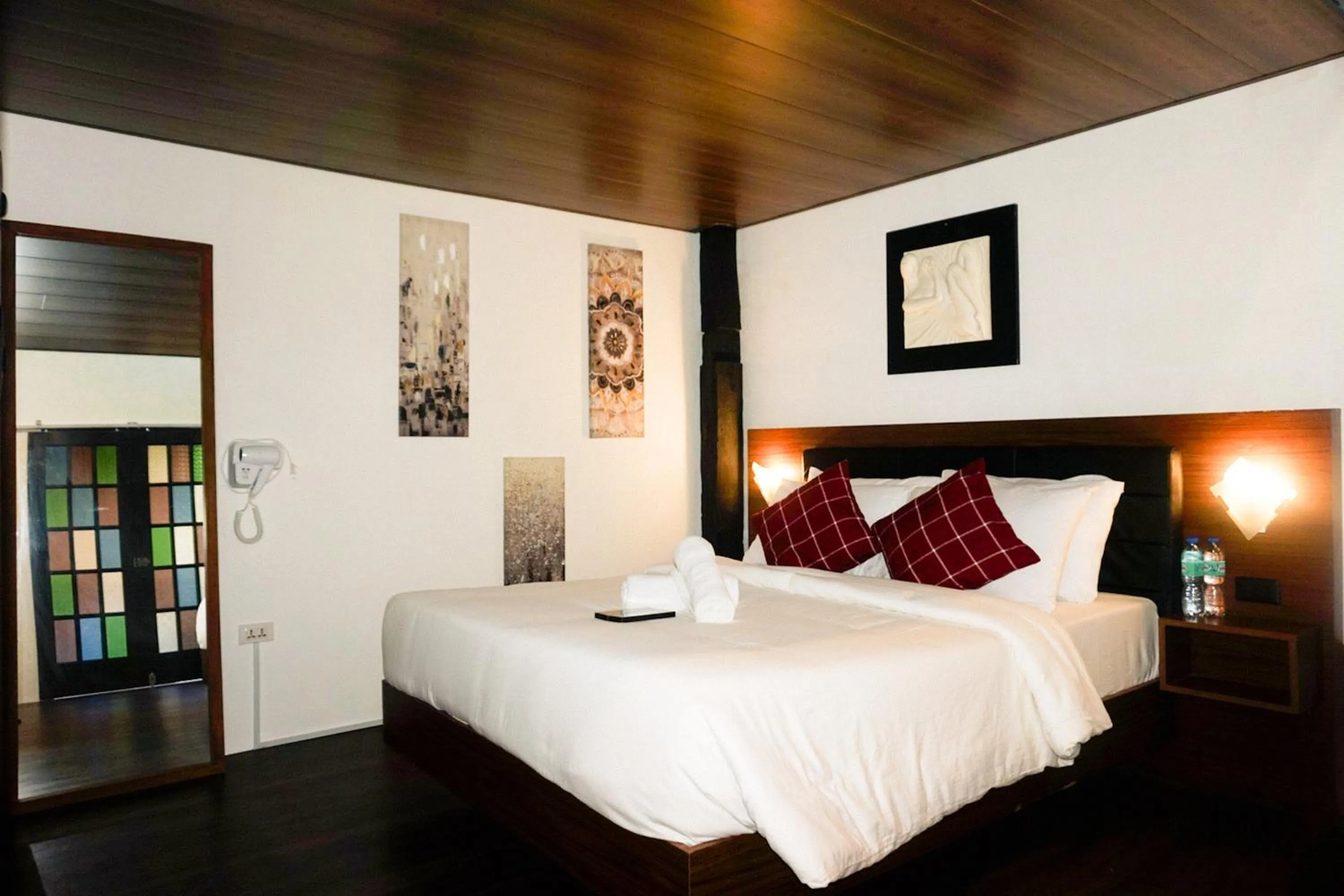 Bed in Ilocos Urban Wave Resort