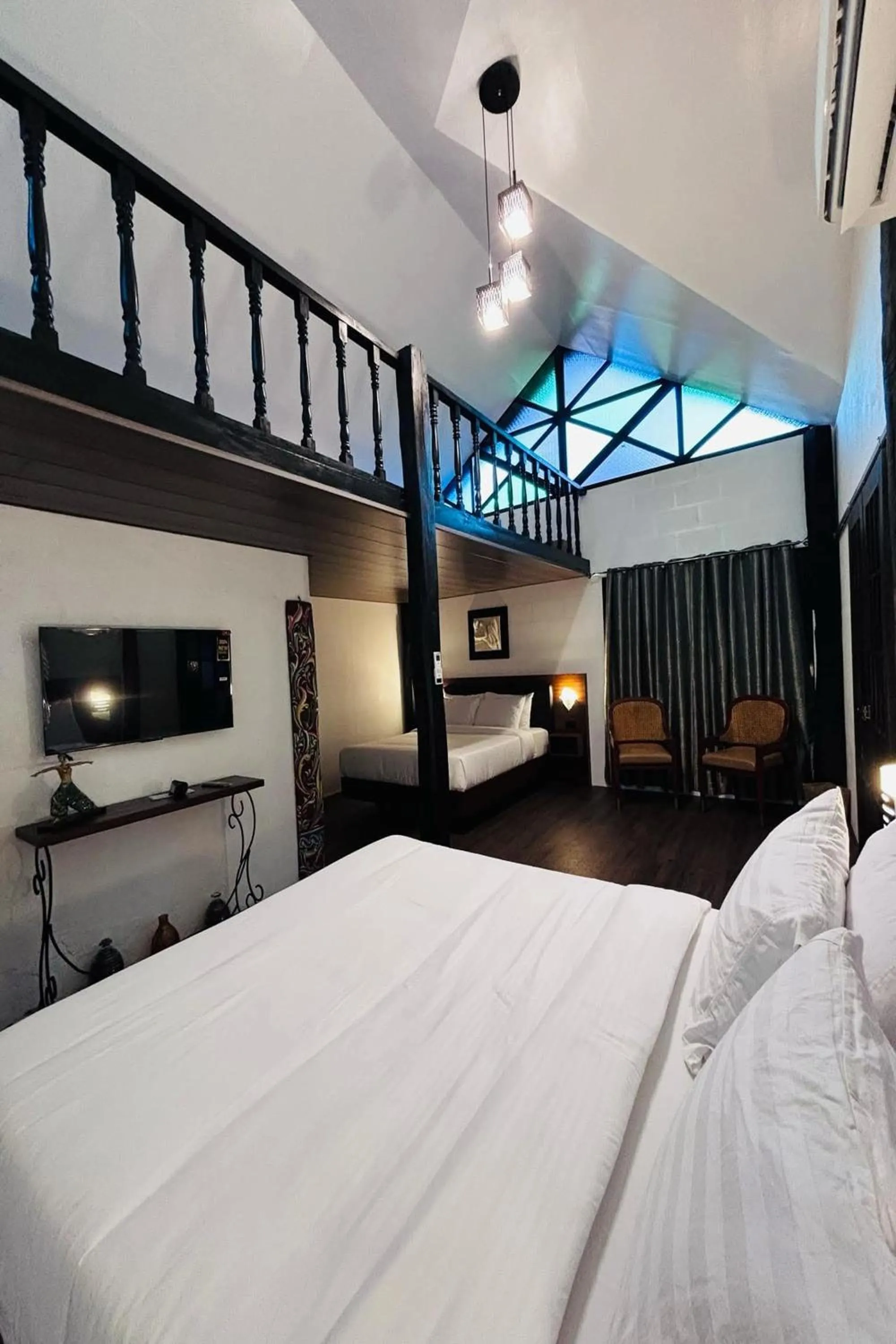 Bed in Ilocos Urban Wave Resort