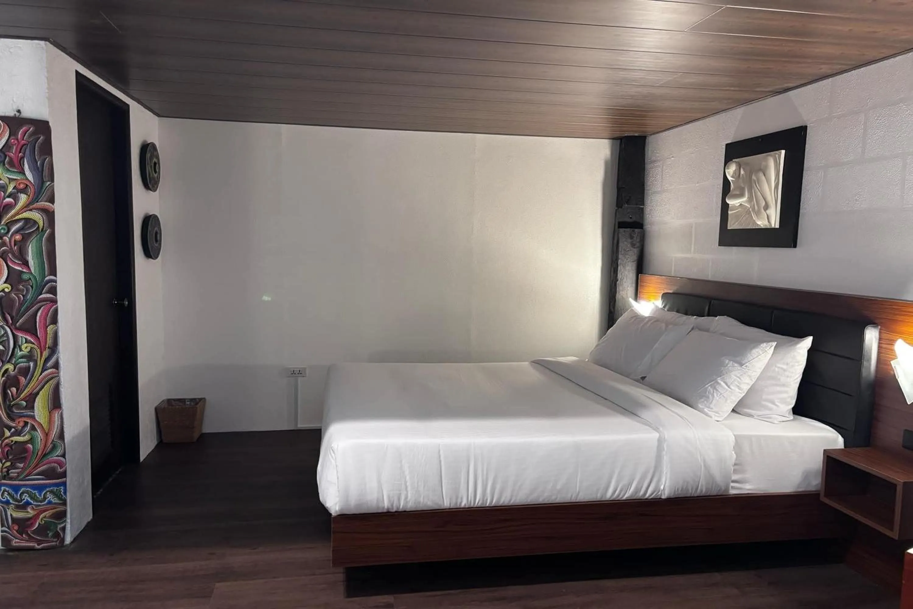 Bed in Ilocos Urban Wave Resort