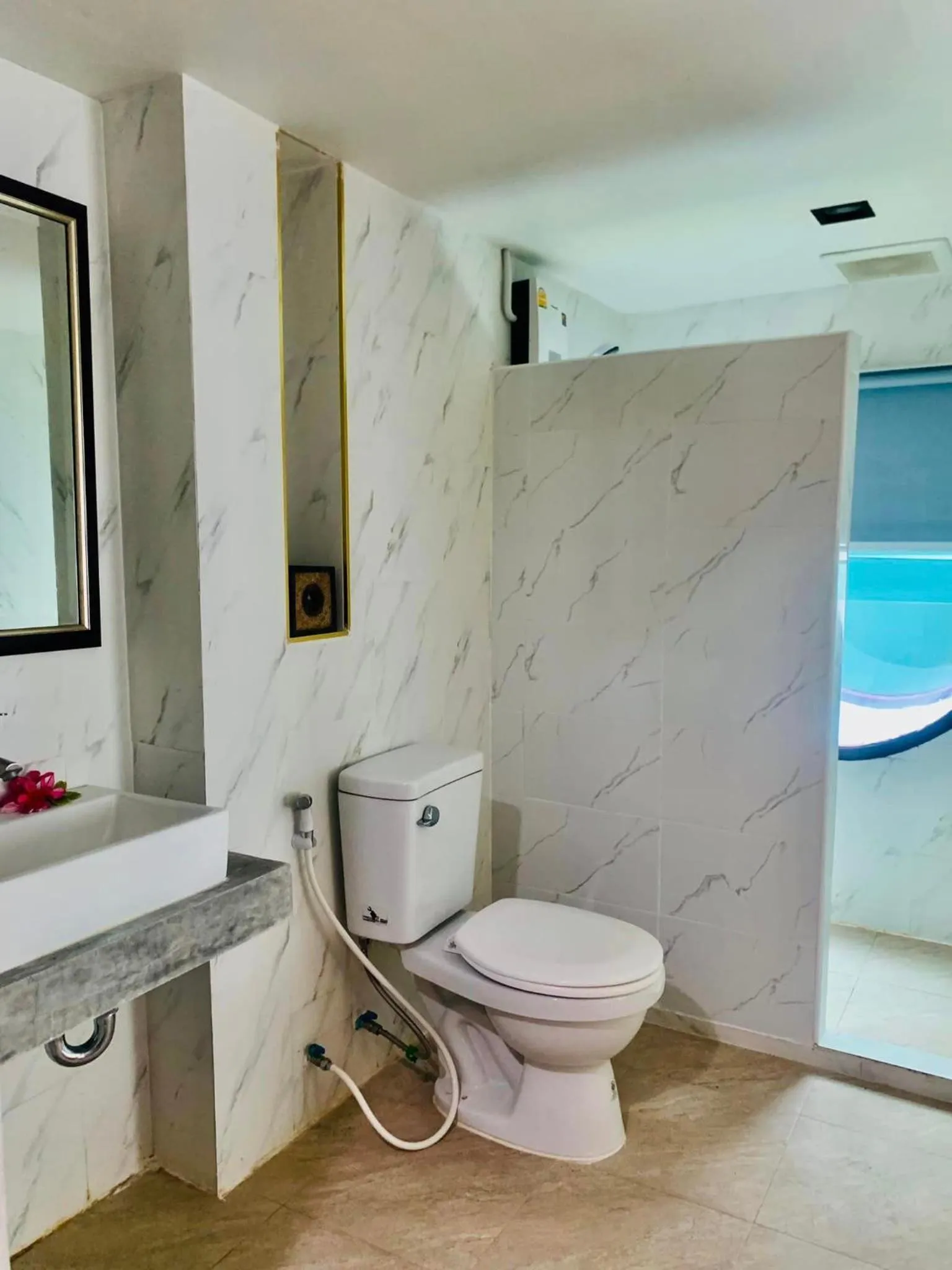Bathroom in Andaman Beach Resort by Zodiac
