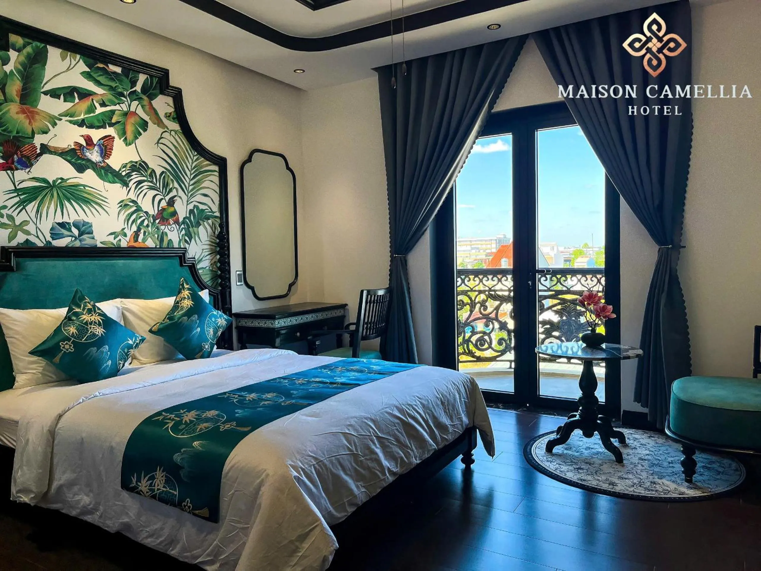 Bed in MAISON CAMELLIA Hotel