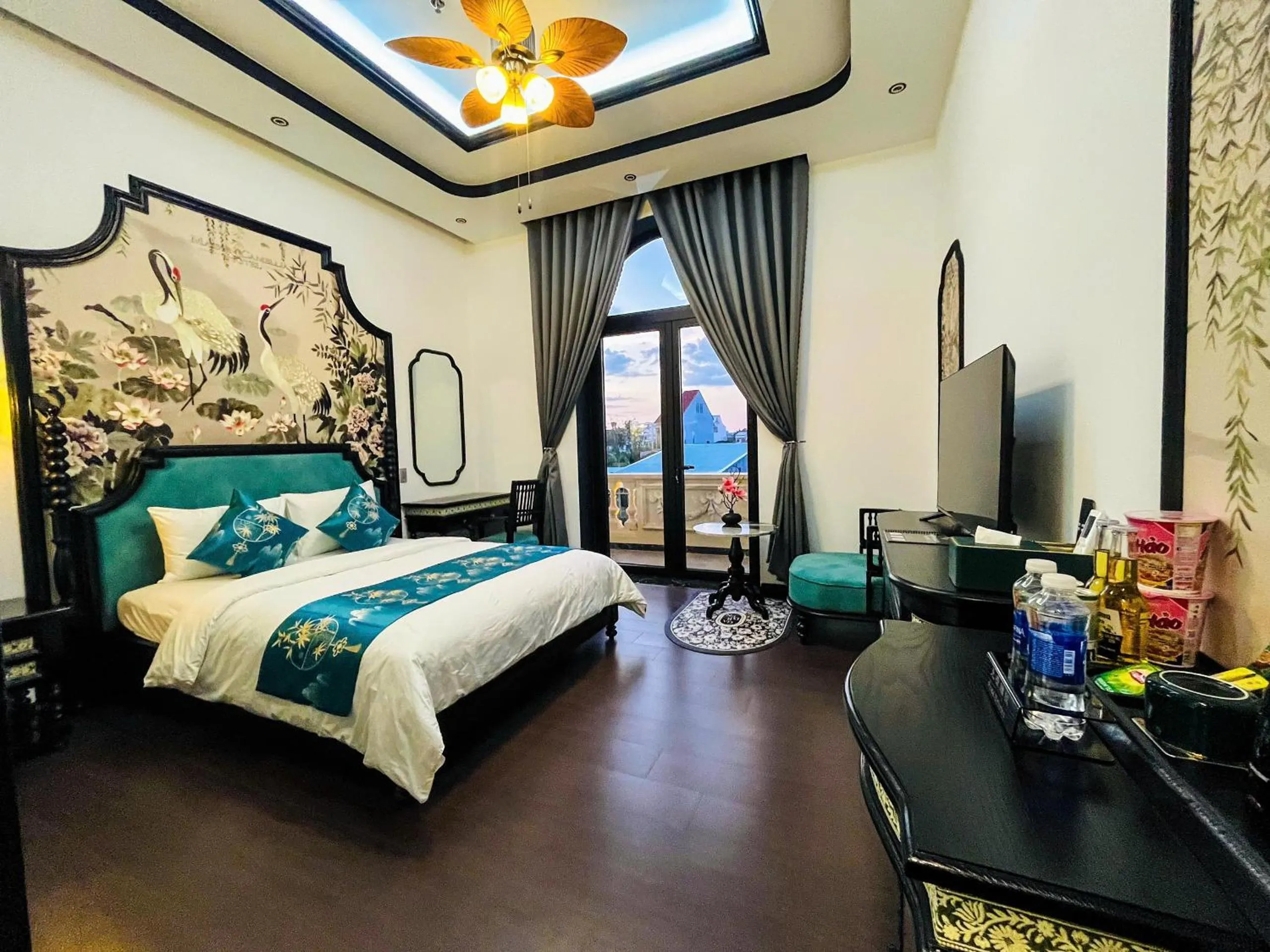 Bed in MAISON CAMELLIA Hotel