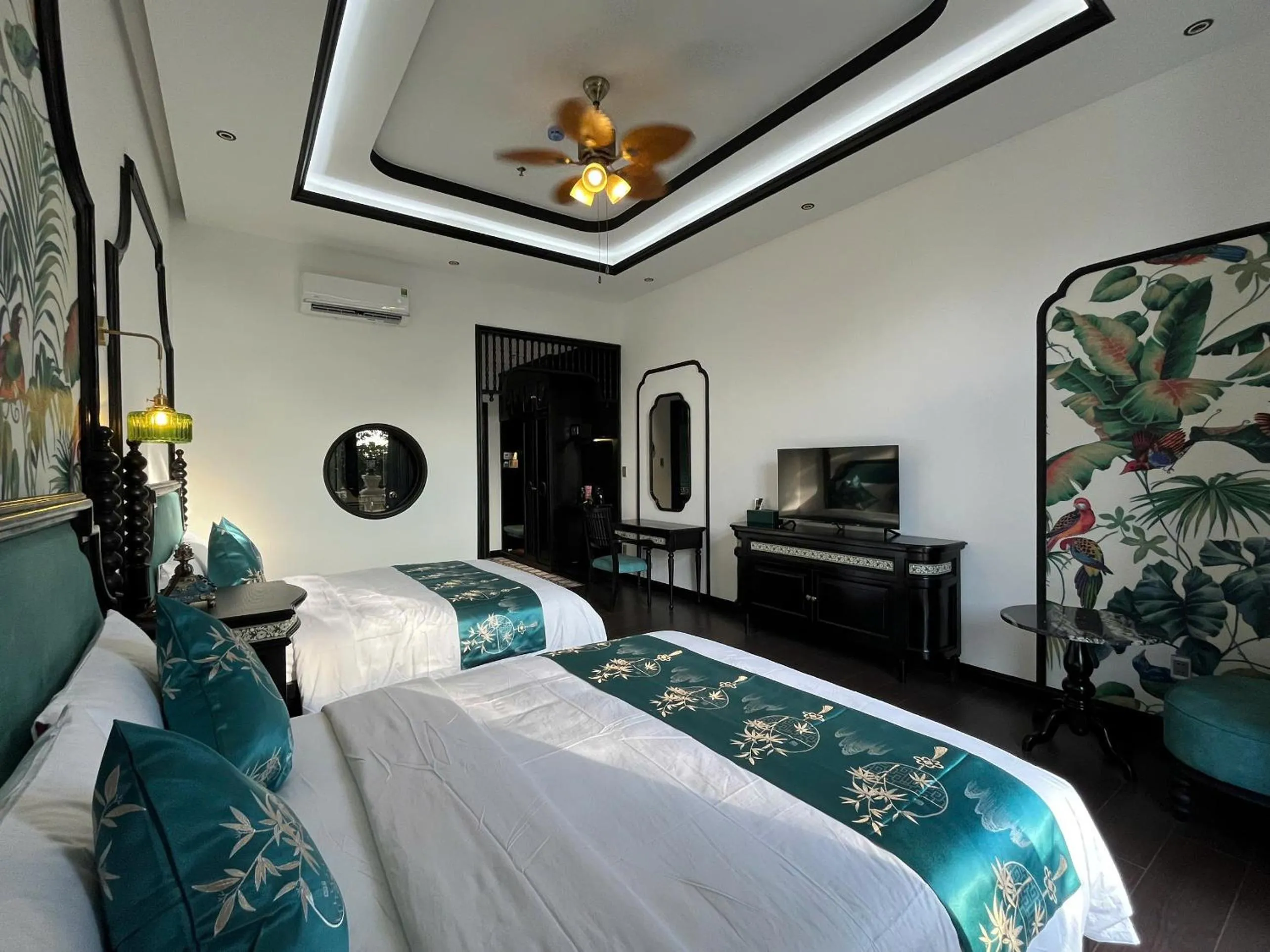 Bed in MAISON CAMELLIA Hotel