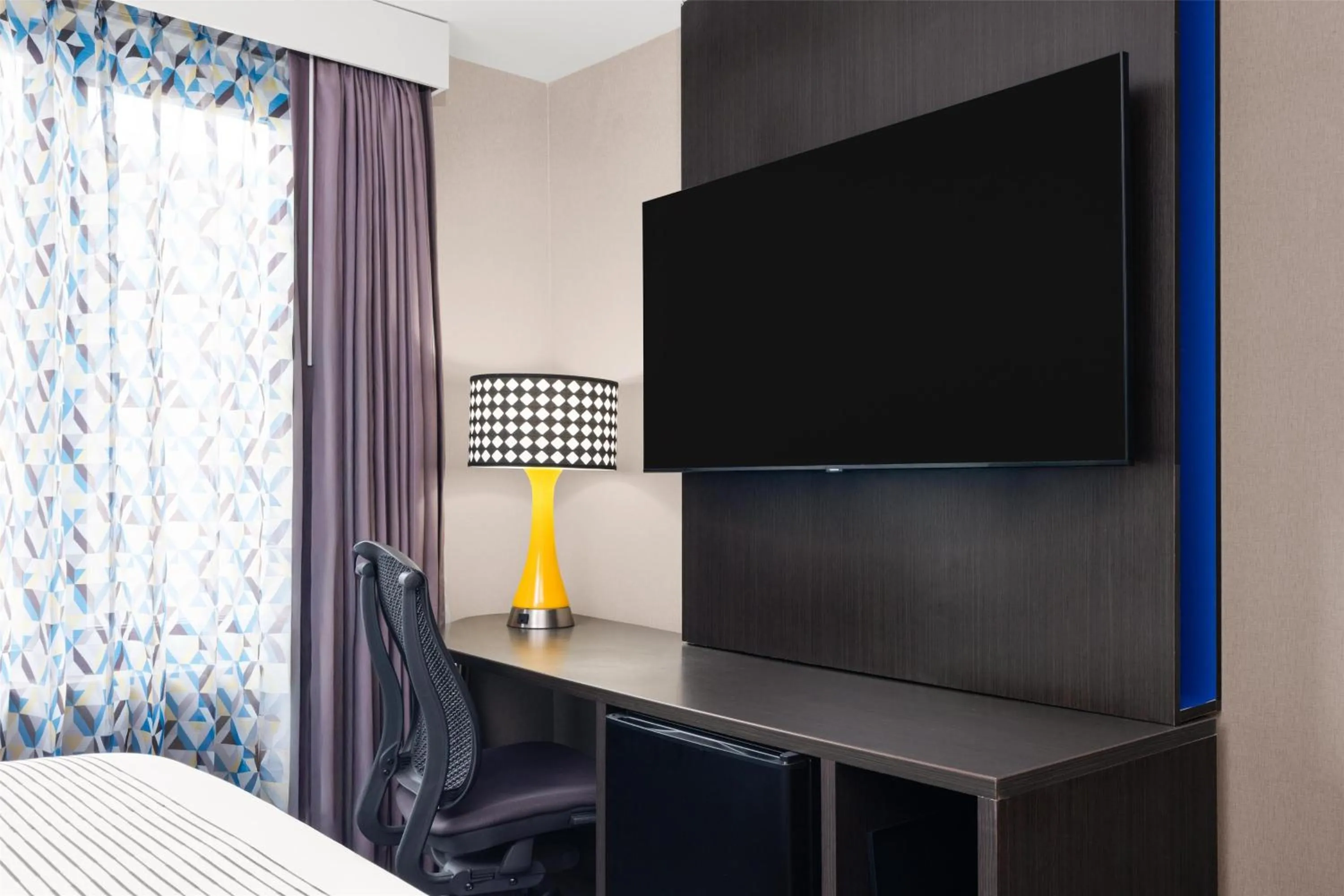 Bedroom in GLō Best Western Bronx NYC