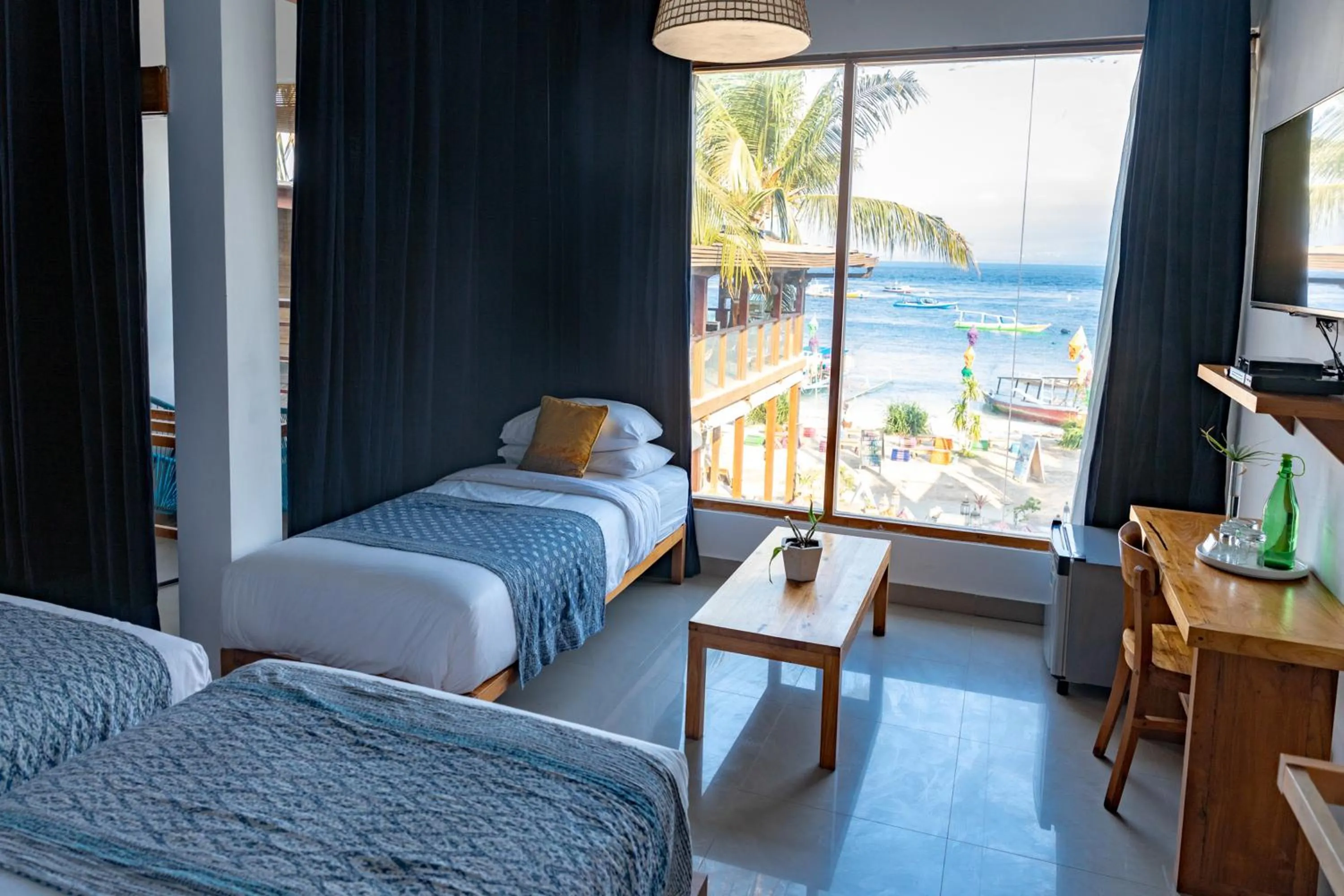 Photo of the whole room, Bed in Pesona Beach Resort & Spa - Adults Only