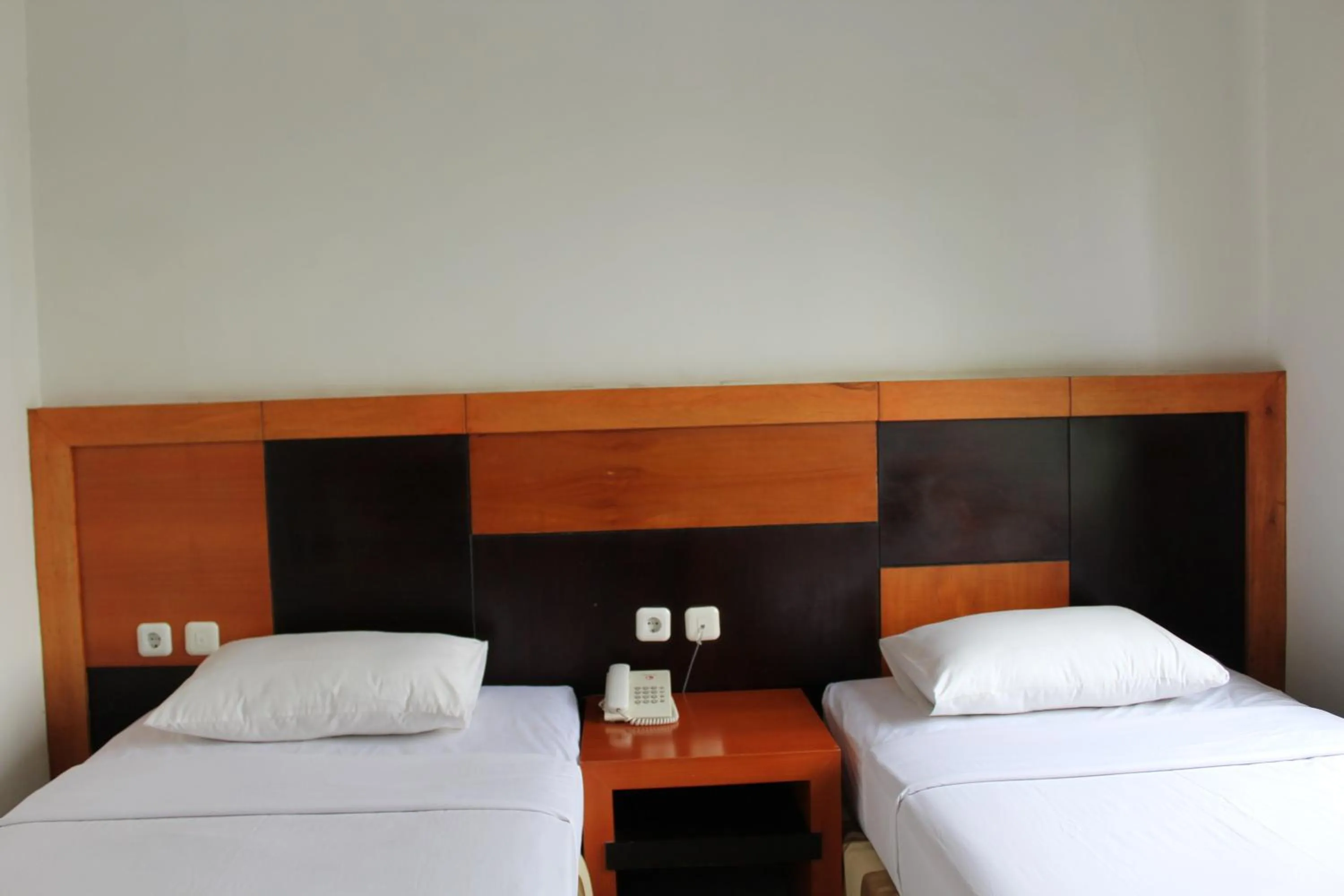 Bed in Hotel Grand Karawang Indah