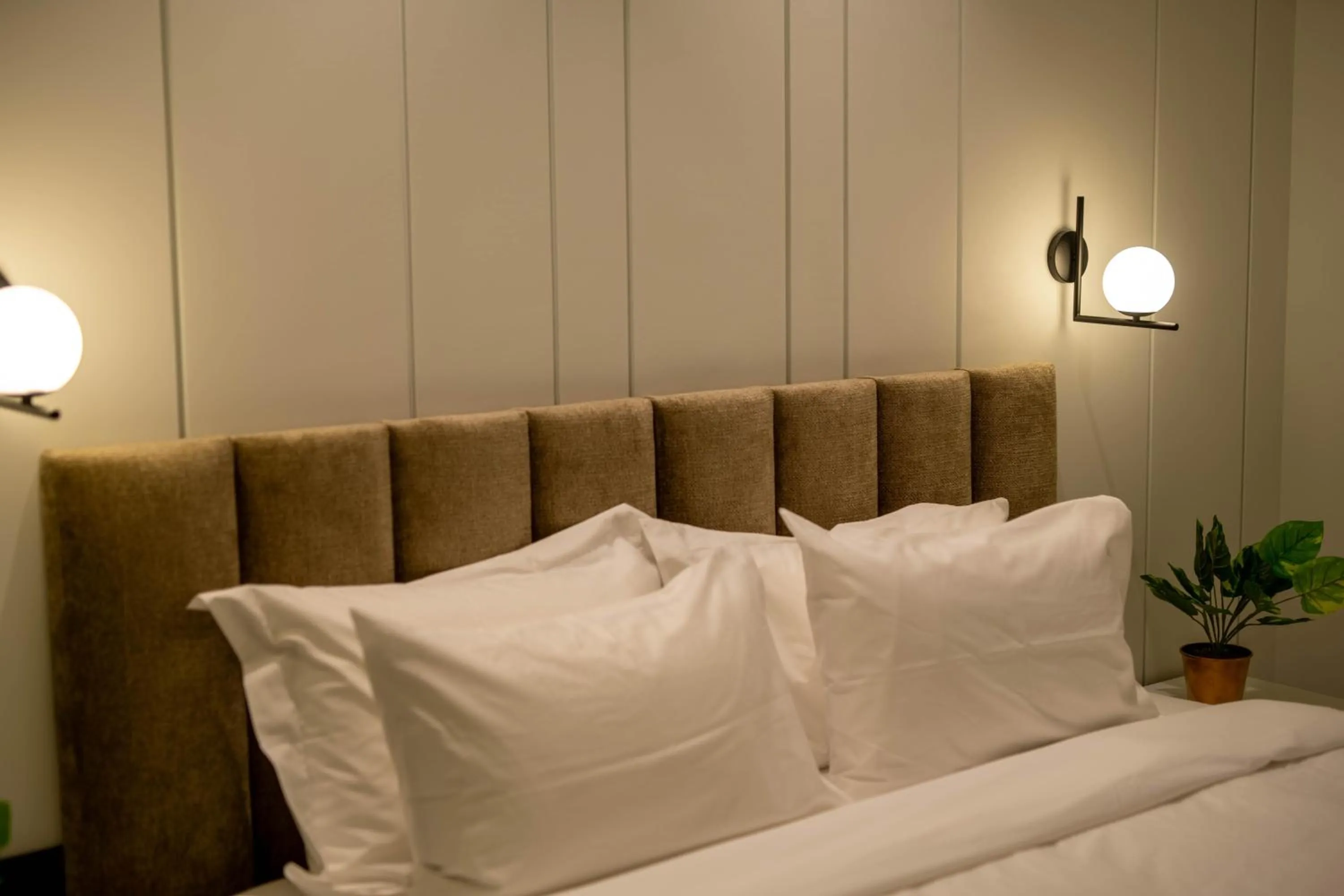 Bed in Whisper Athens Suites