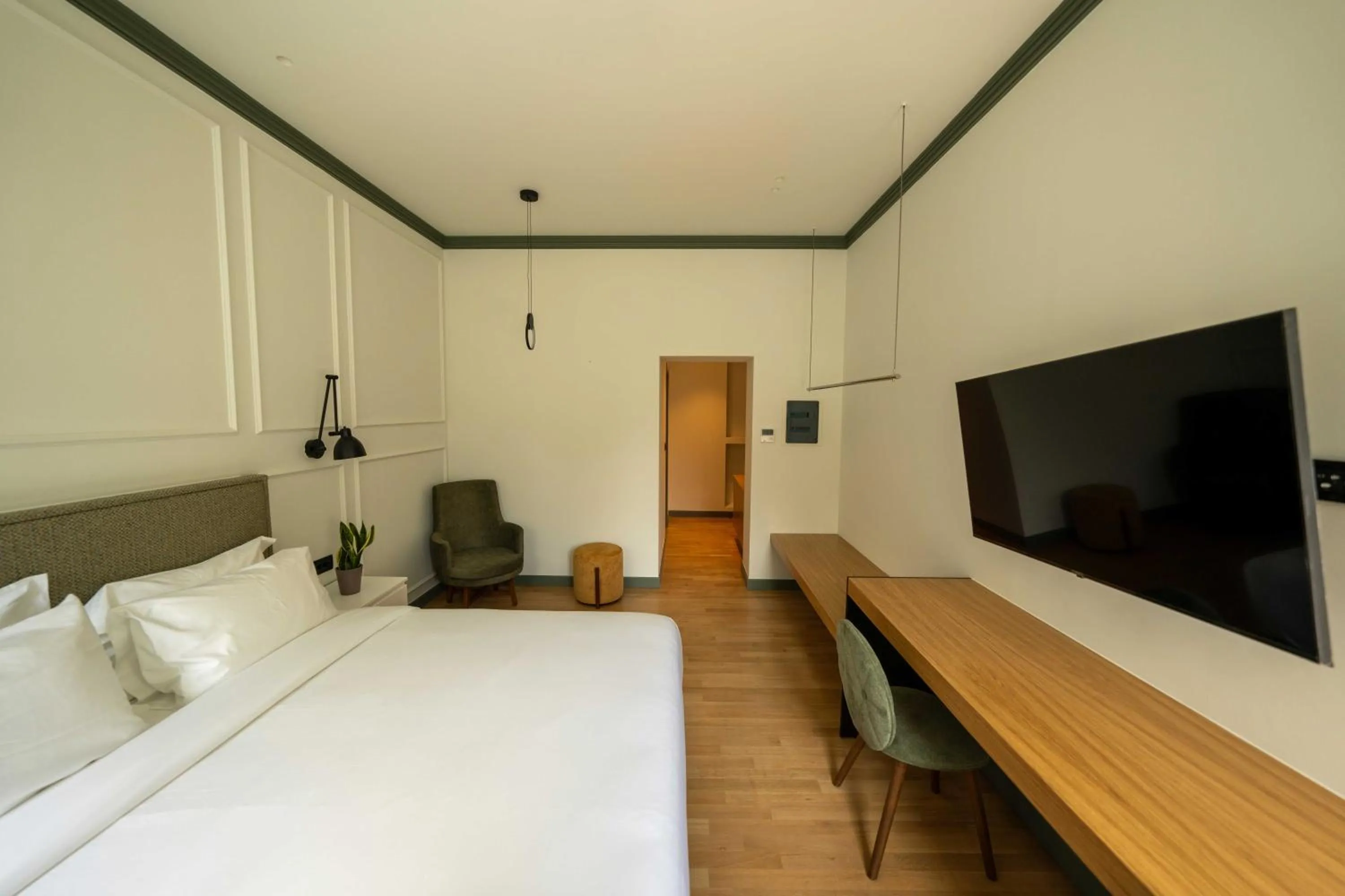 Bed in Whisper Athens Suites