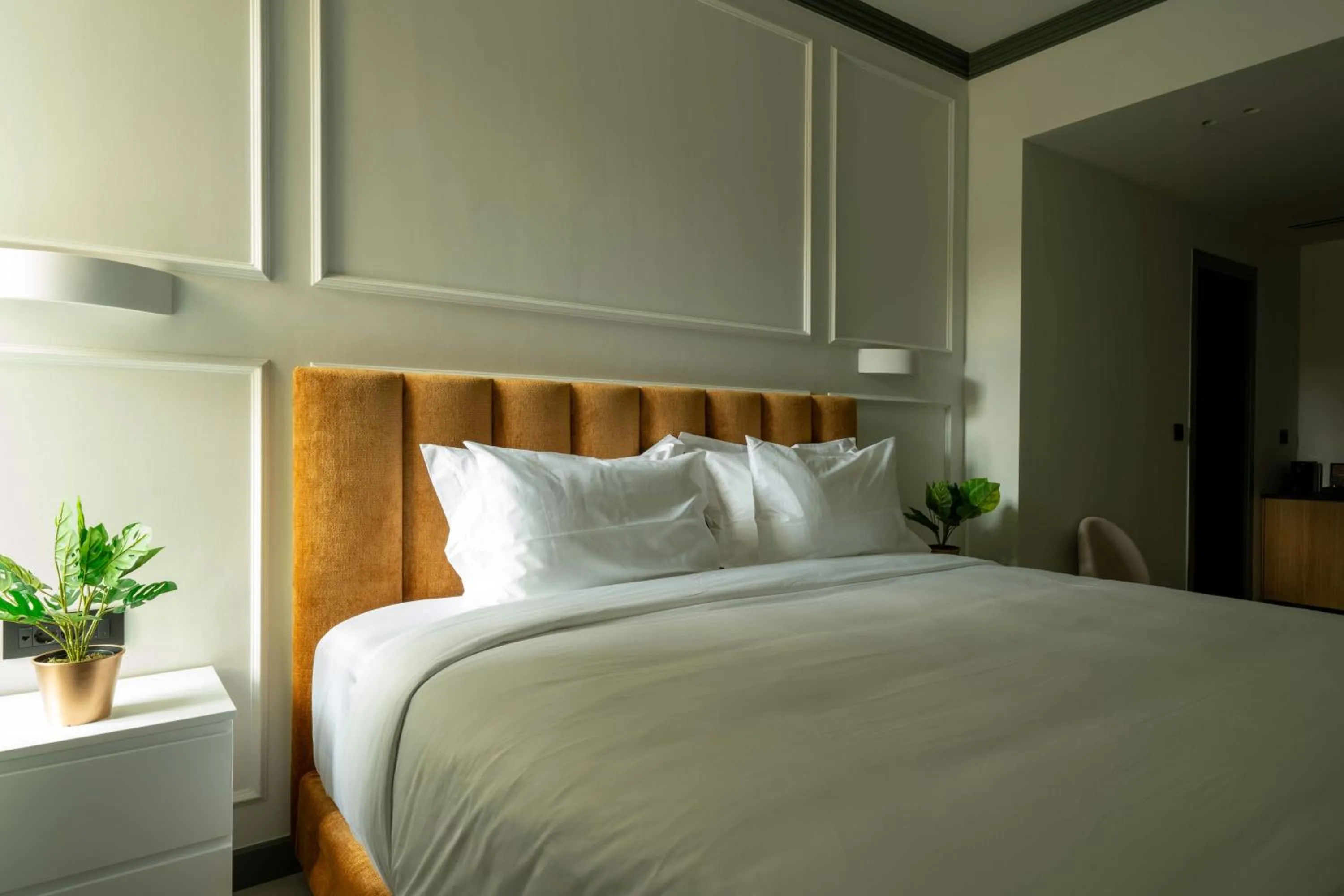 Bed in Whisper Athens Suites