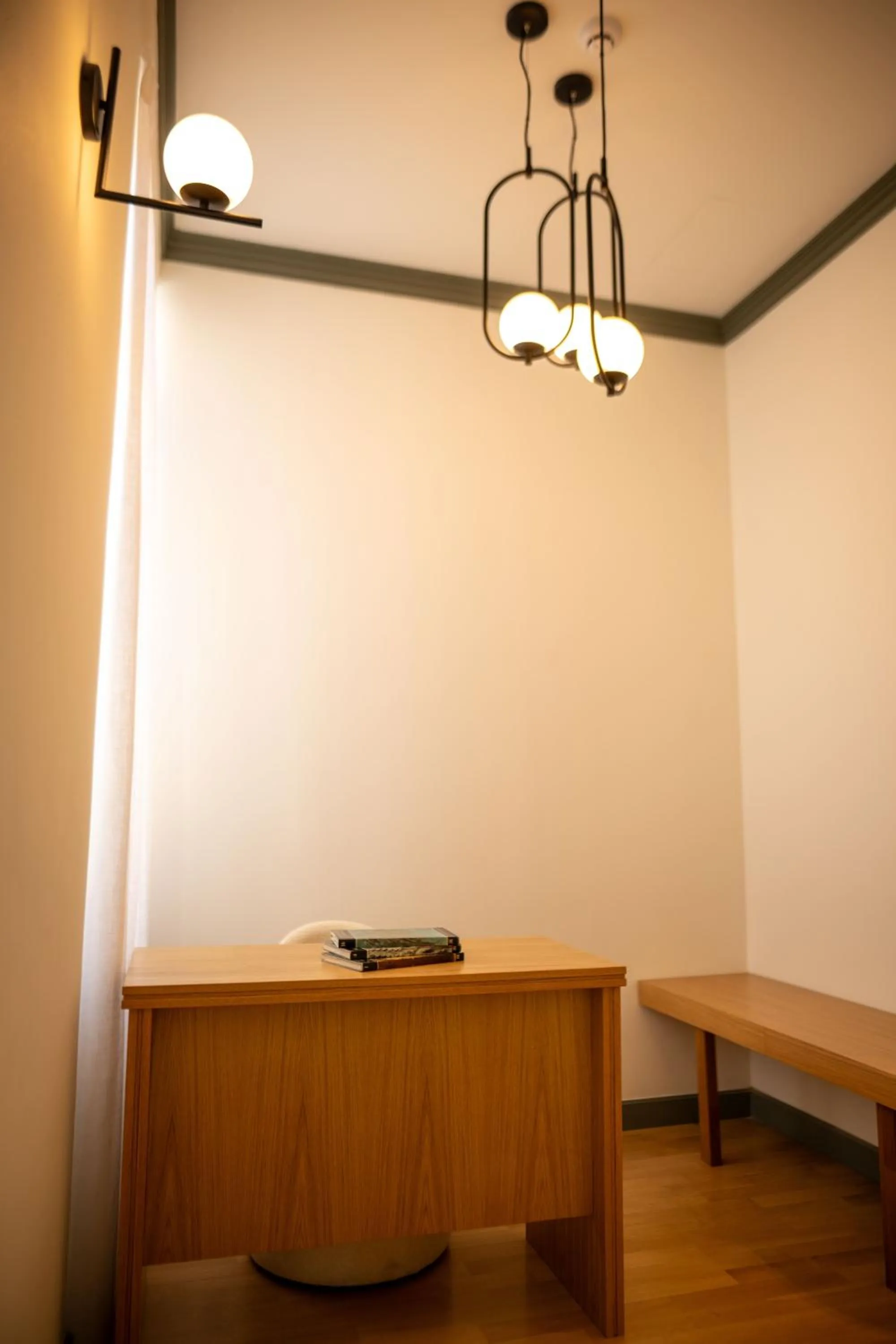 Seating area in Whisper Athens Suites