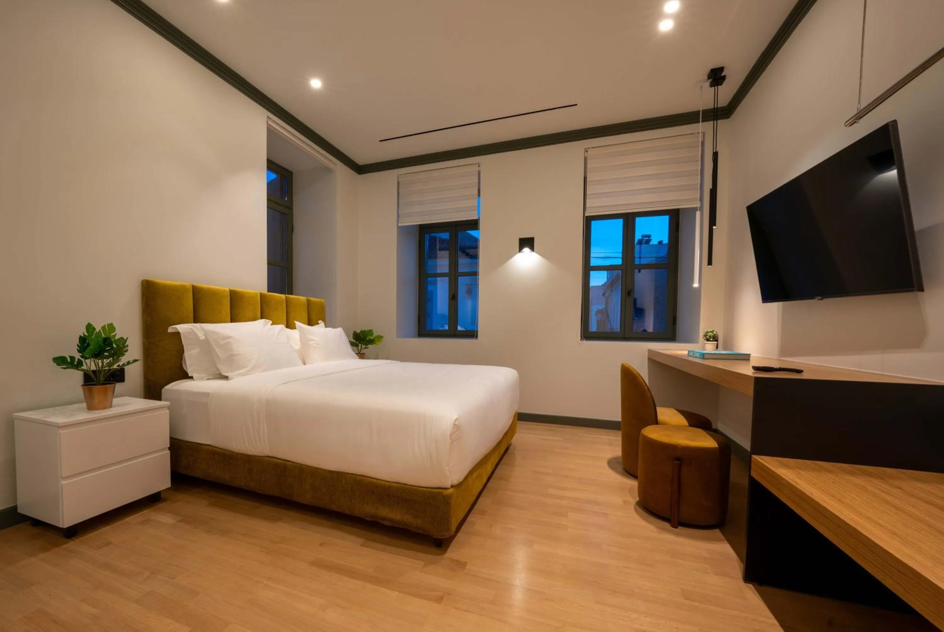 Bed in Whisper Athens Suites