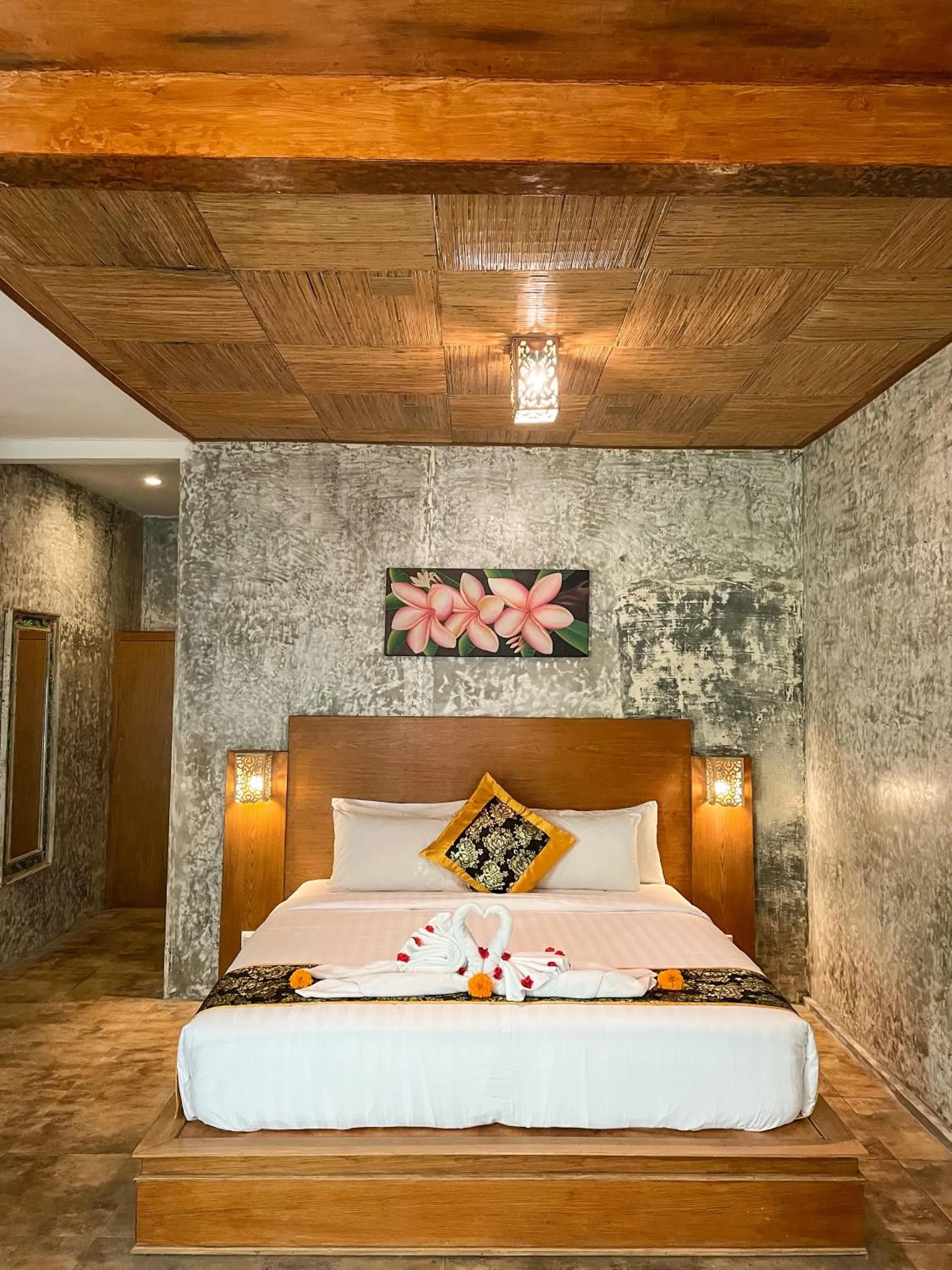 Bed in Senetan Villas and Spa Resort