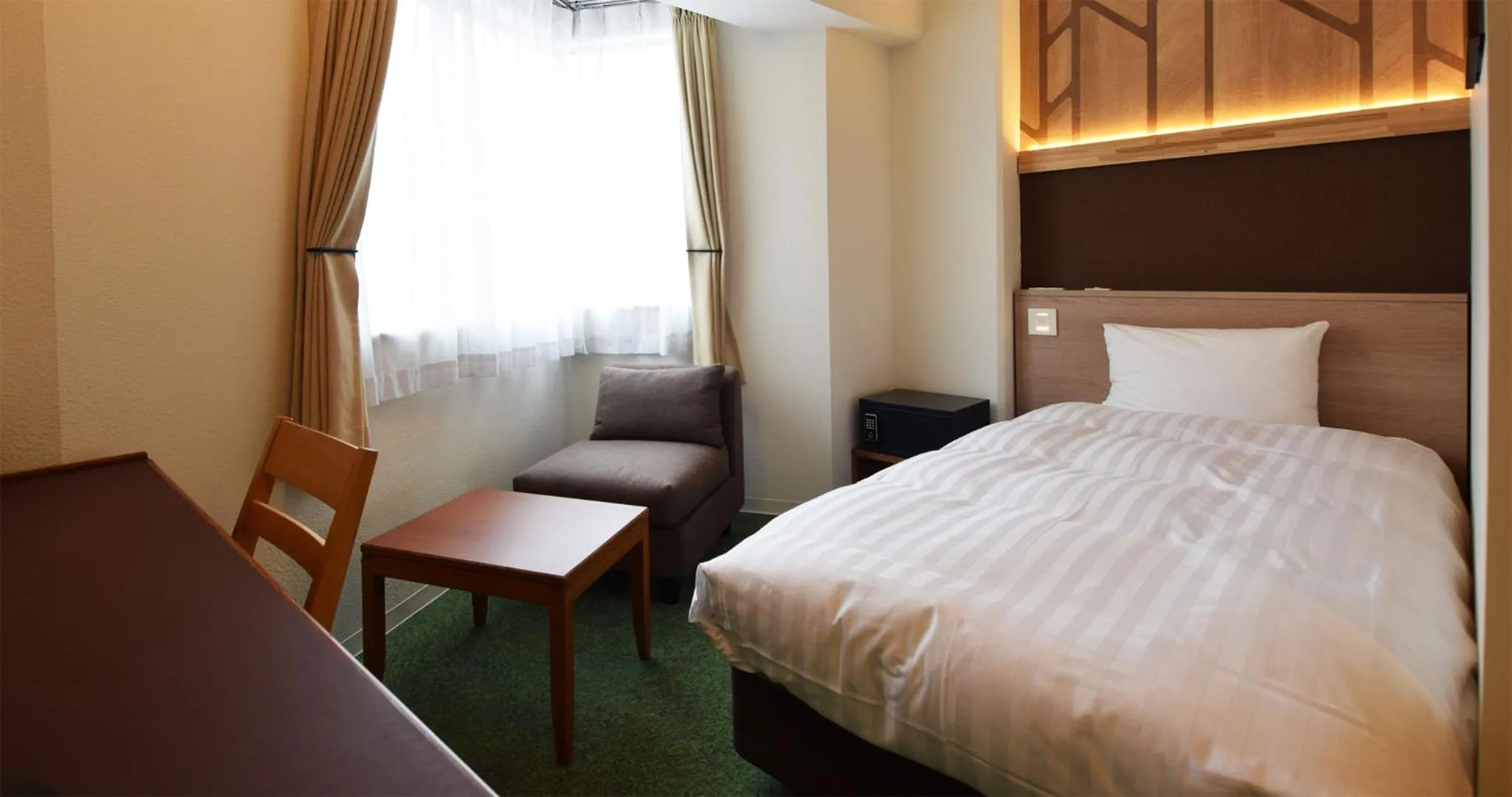 Photo of the whole room, Bed in adex Inn