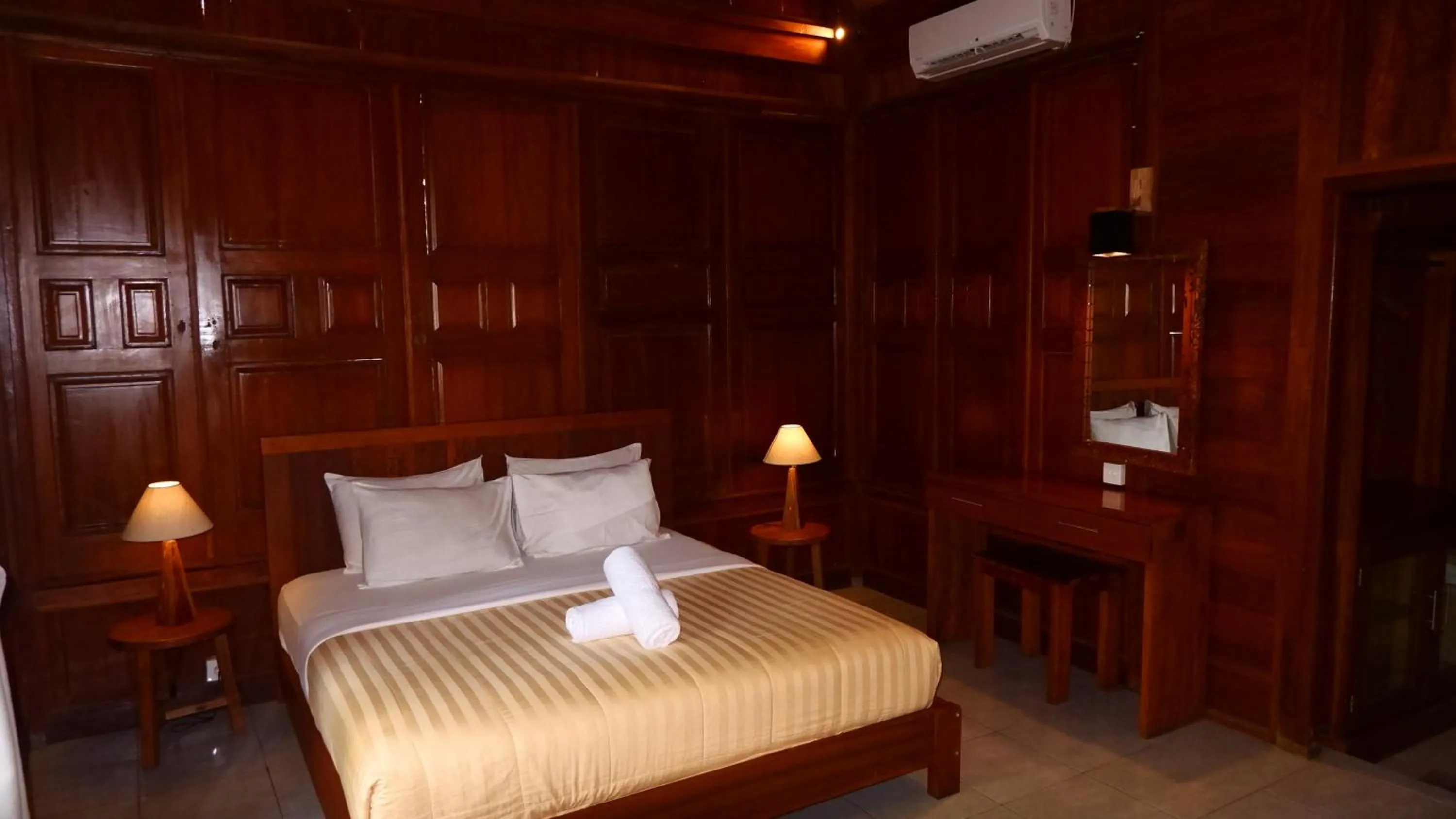 Bed in Mina Tanjung Hotel