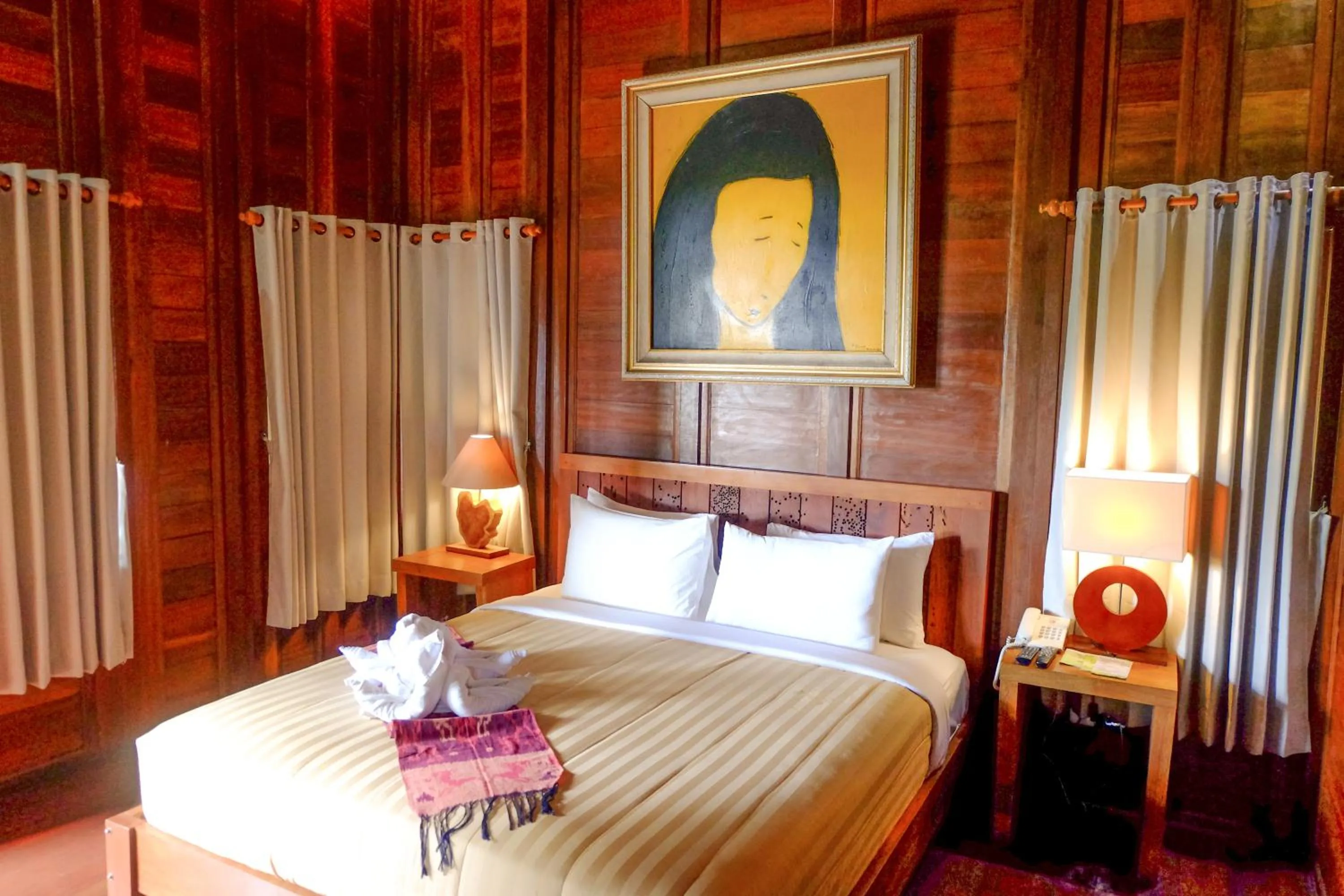 Bed in Mina Tanjung Hotel