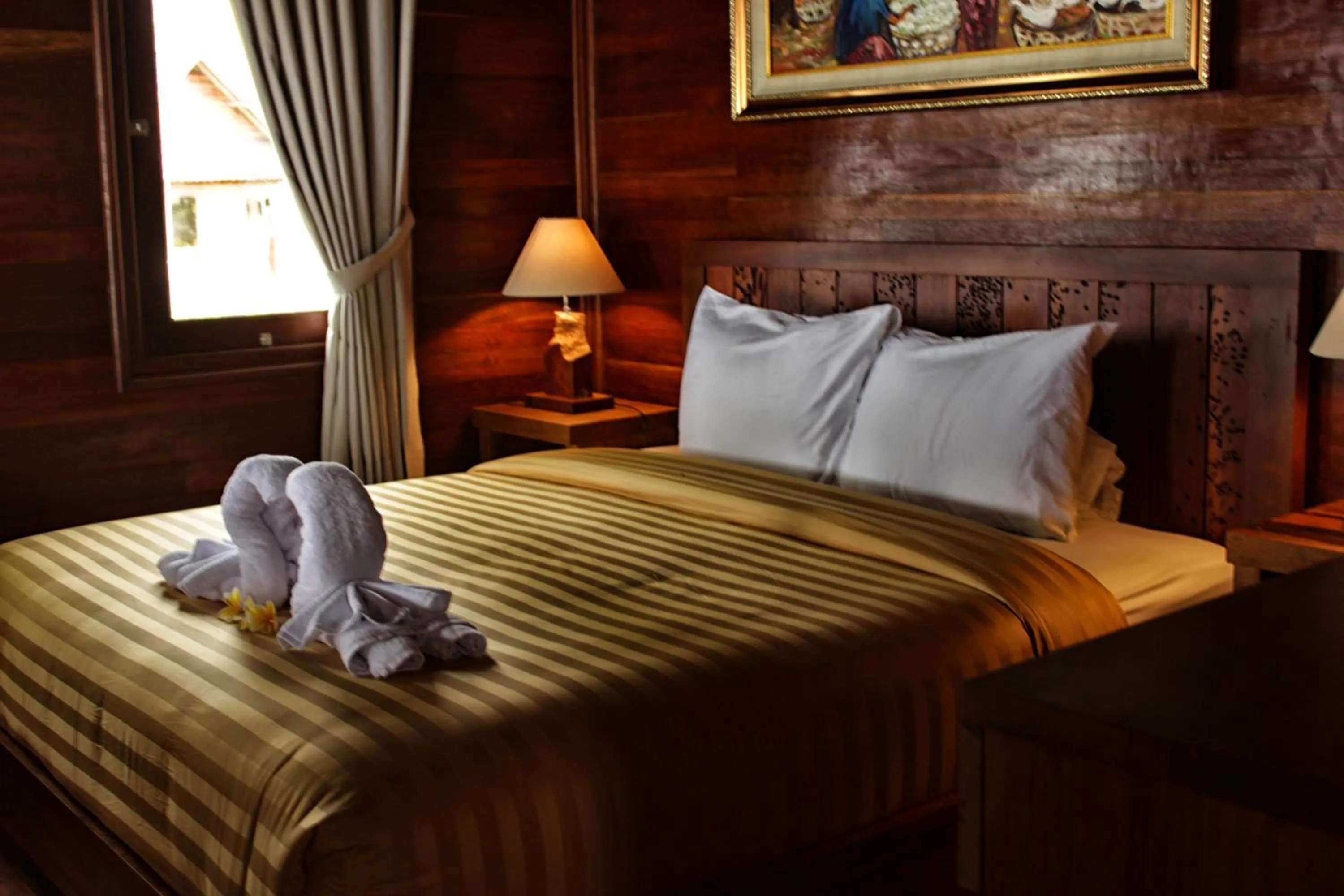 Decorative detail, Bed in Mina Tanjung Hotel