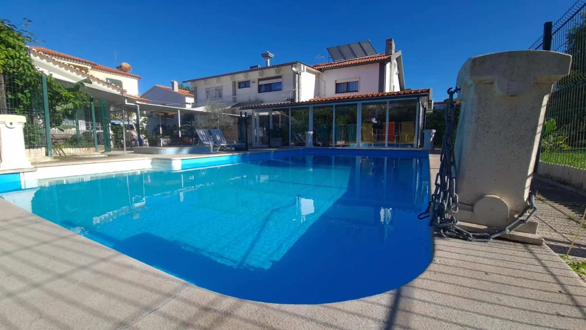 Swimming pool in Hostel Jardins de São Luís