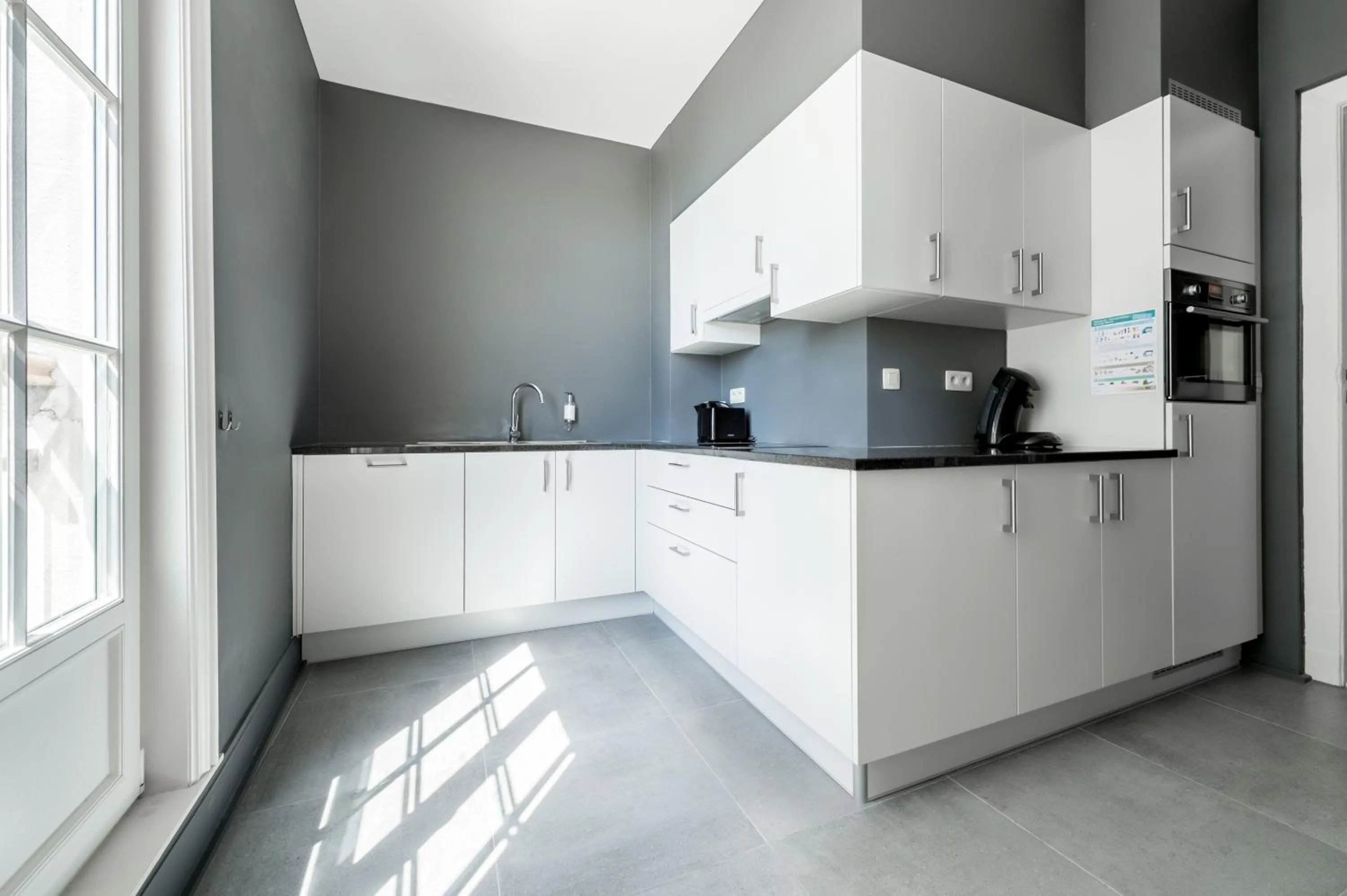 Kitchen or kitchenette in Smartflats - Gaité