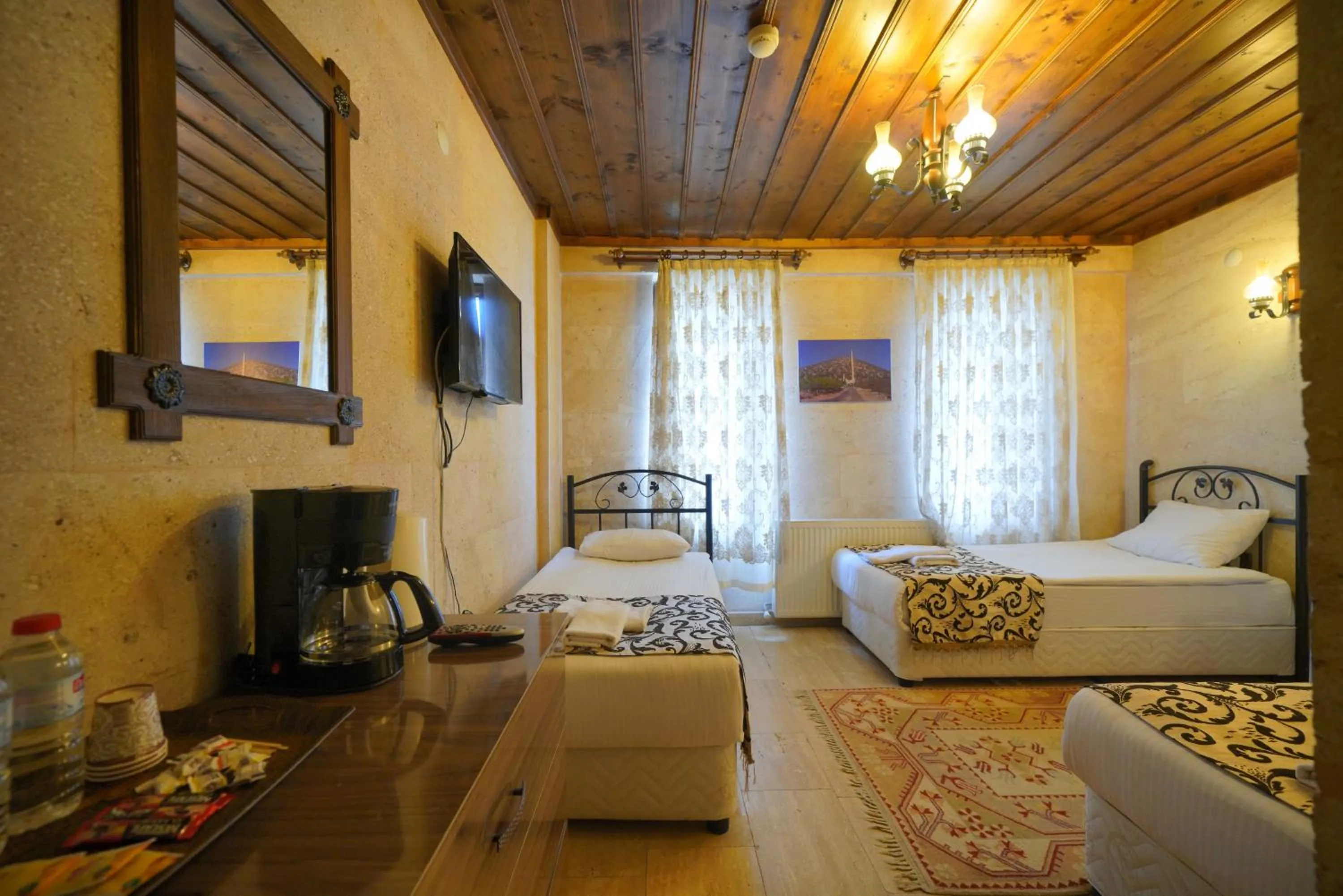 Bed in Goreme Cave Rooms&Pool