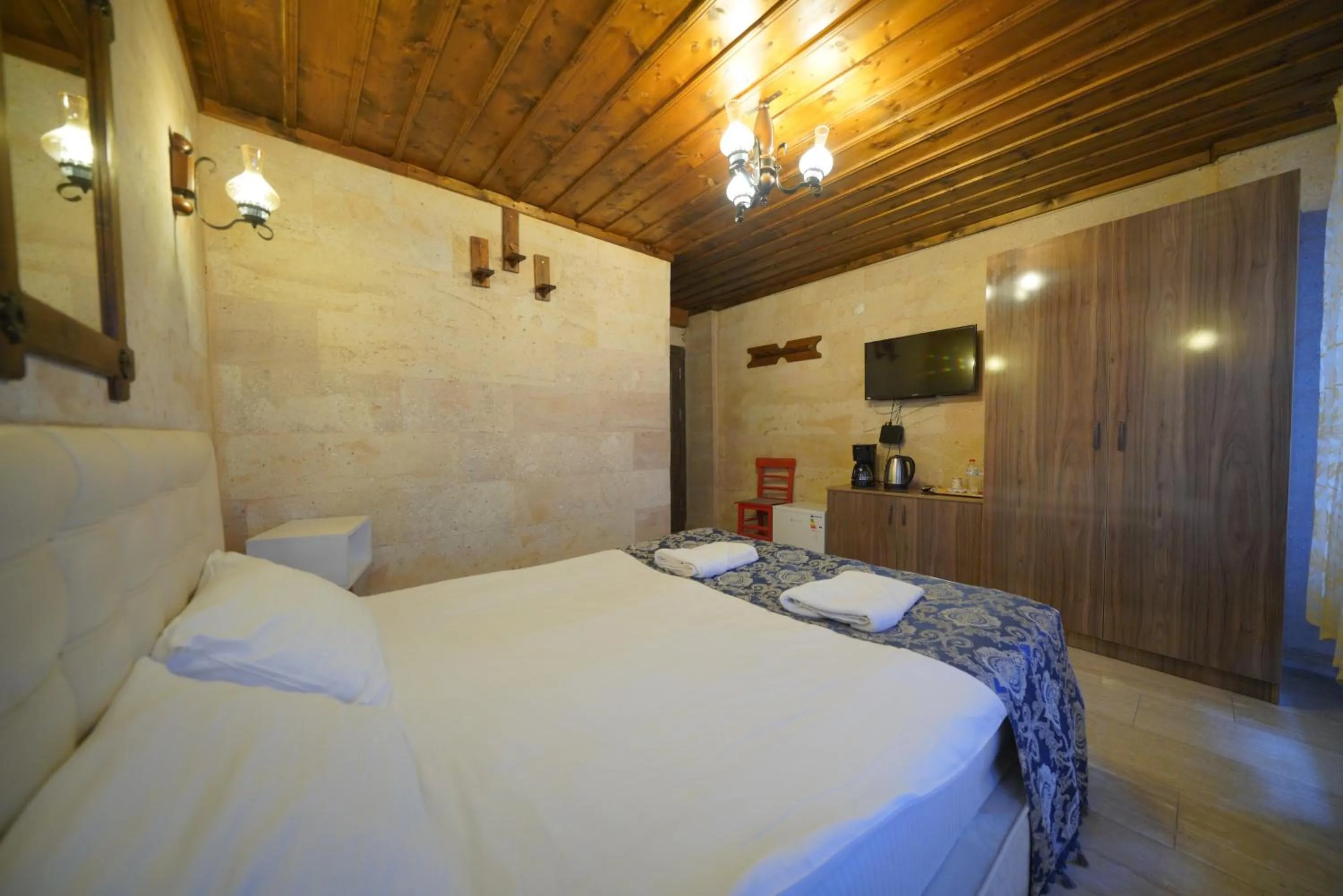 Bed in Goreme Cave Rooms&Pool