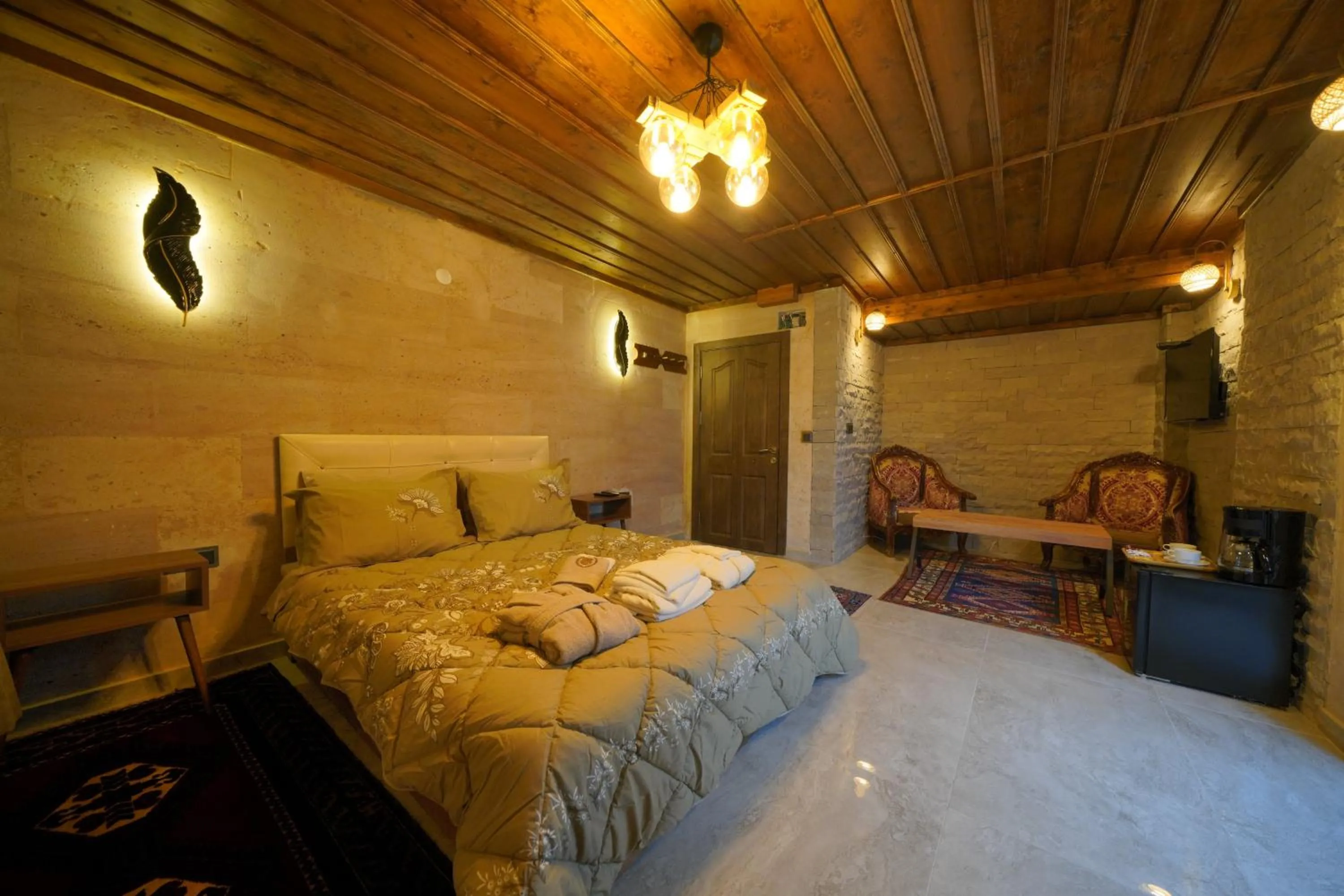 Bed in Goreme Cave Rooms&Pool