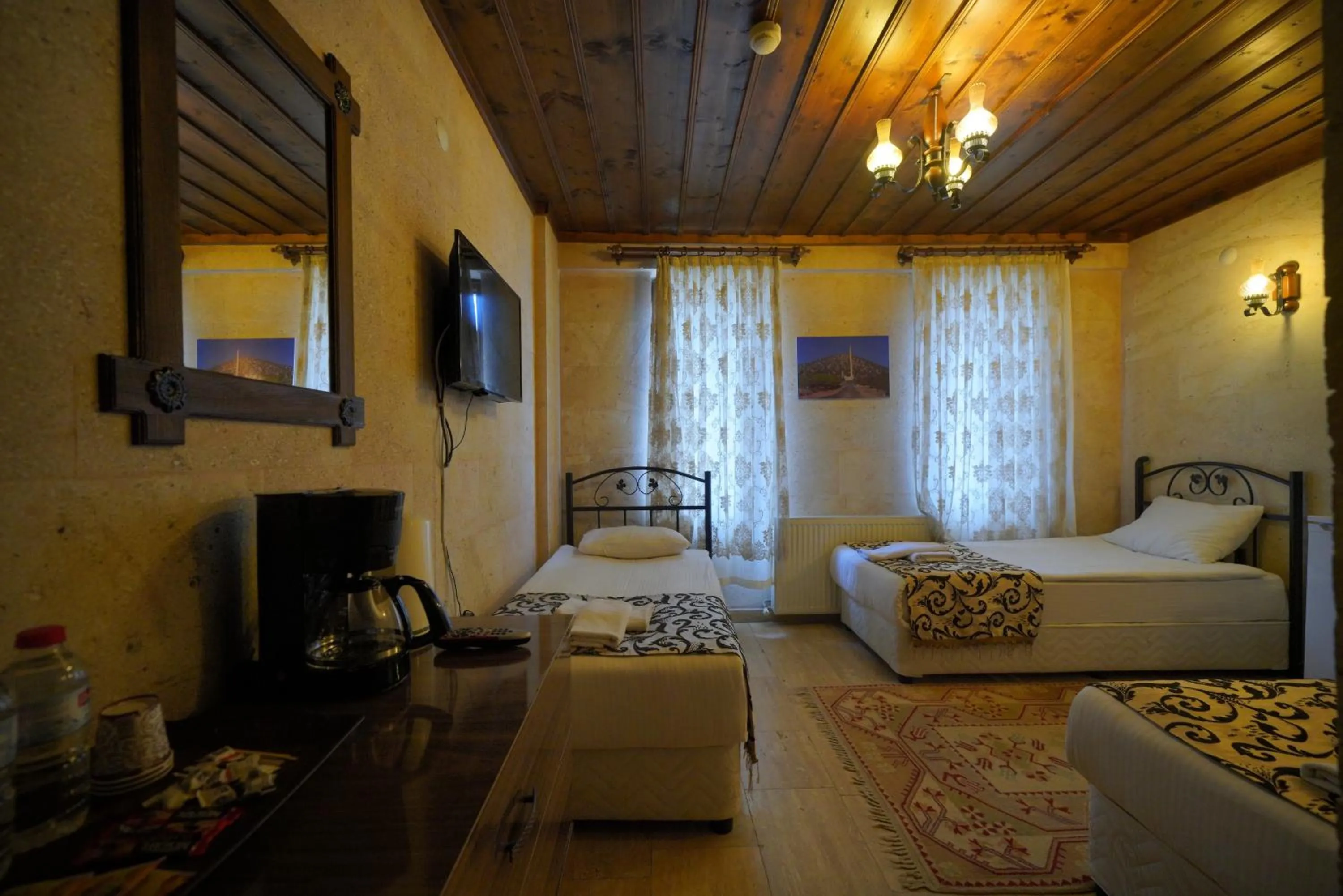 Bed in Goreme Cave Rooms&Pool