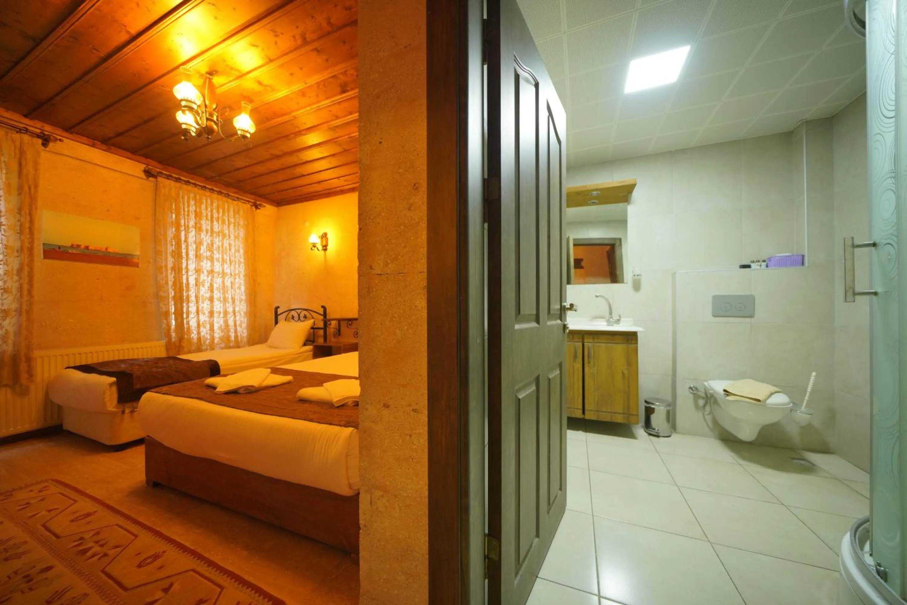 Shower, Bed in Goreme Cave Rooms&Pool