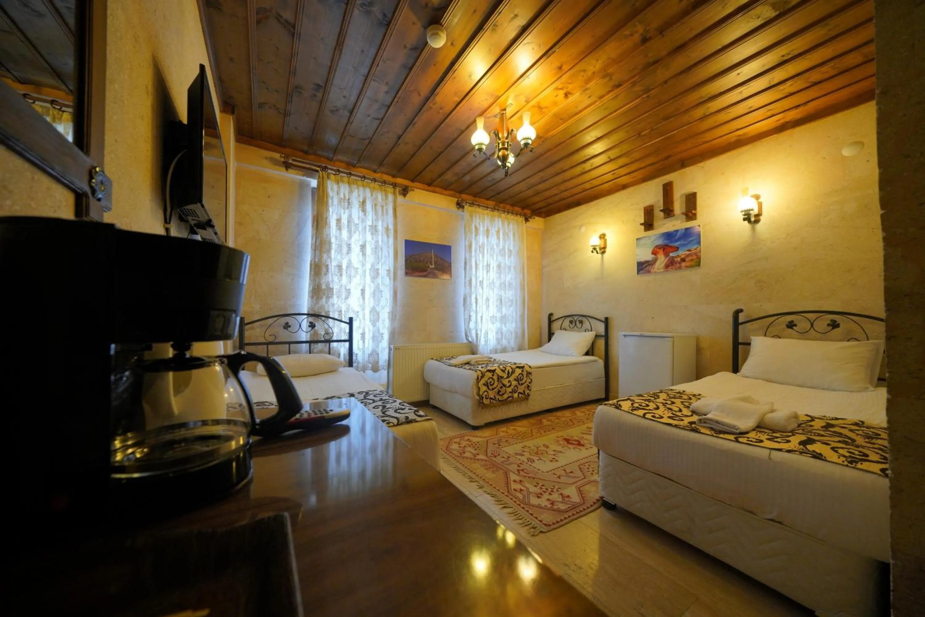 Bed in Goreme Cave Rooms&Pool