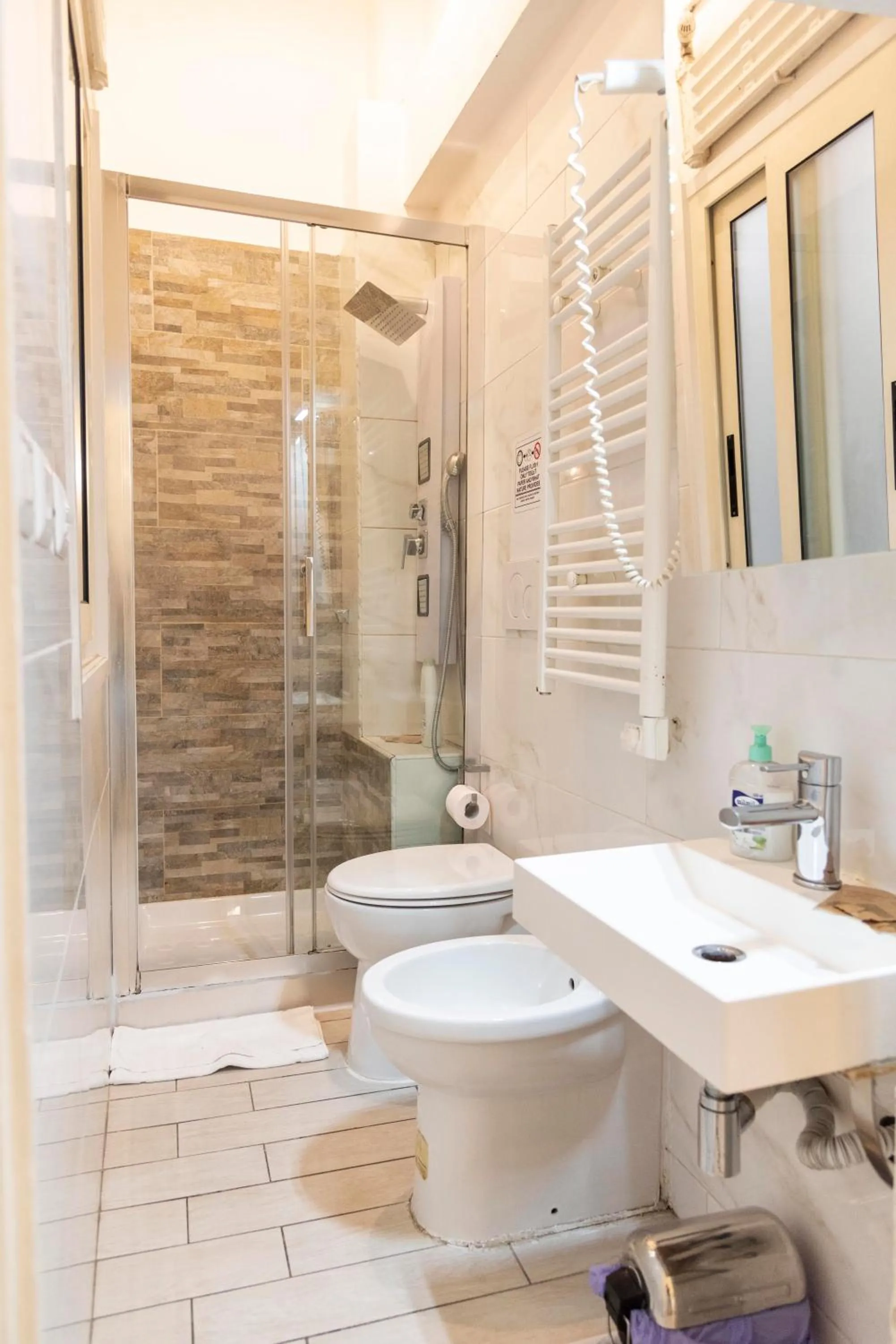 Toilet in Merulana Suite Apartment