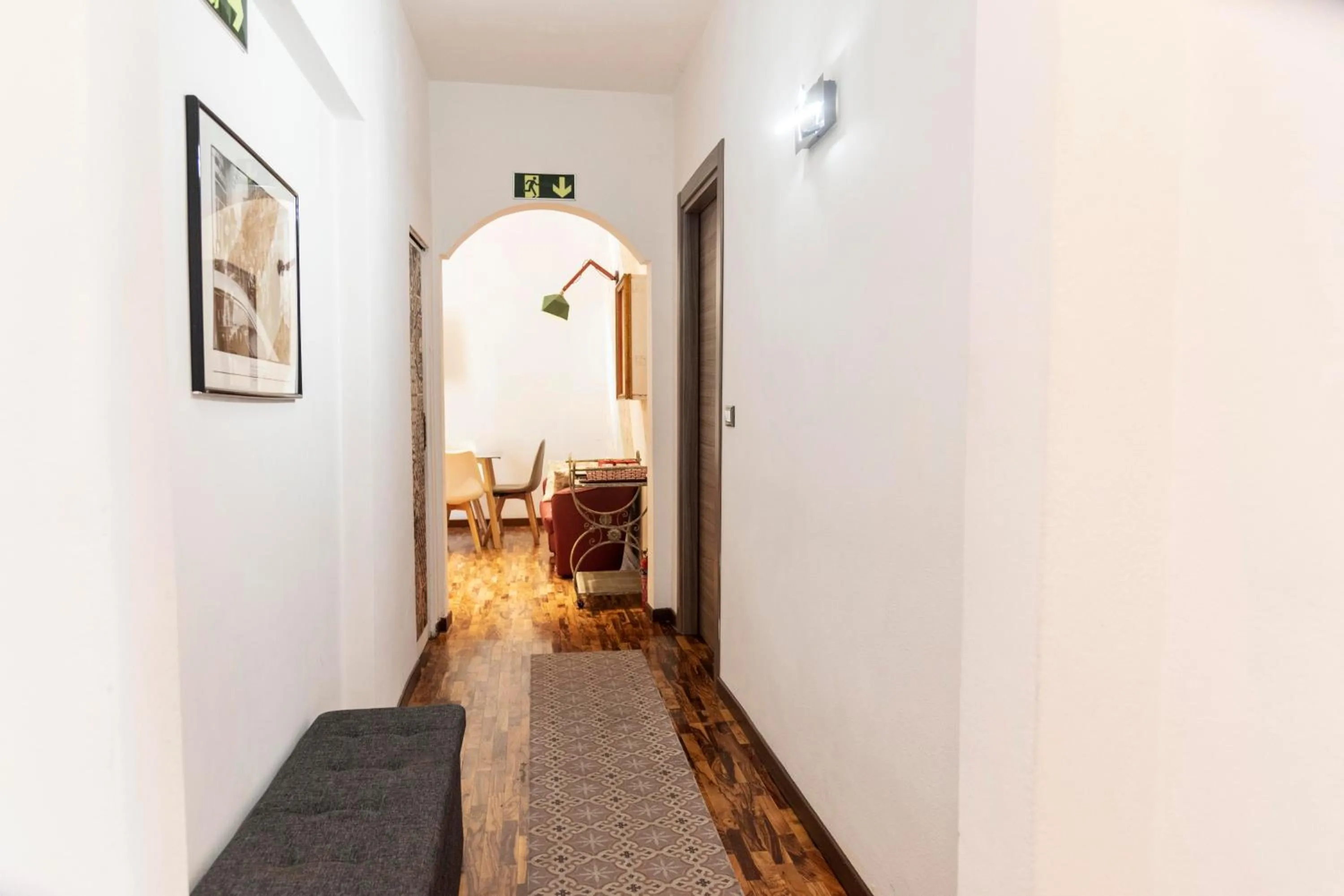 Living room, Bed in Merulana Suite Apartment