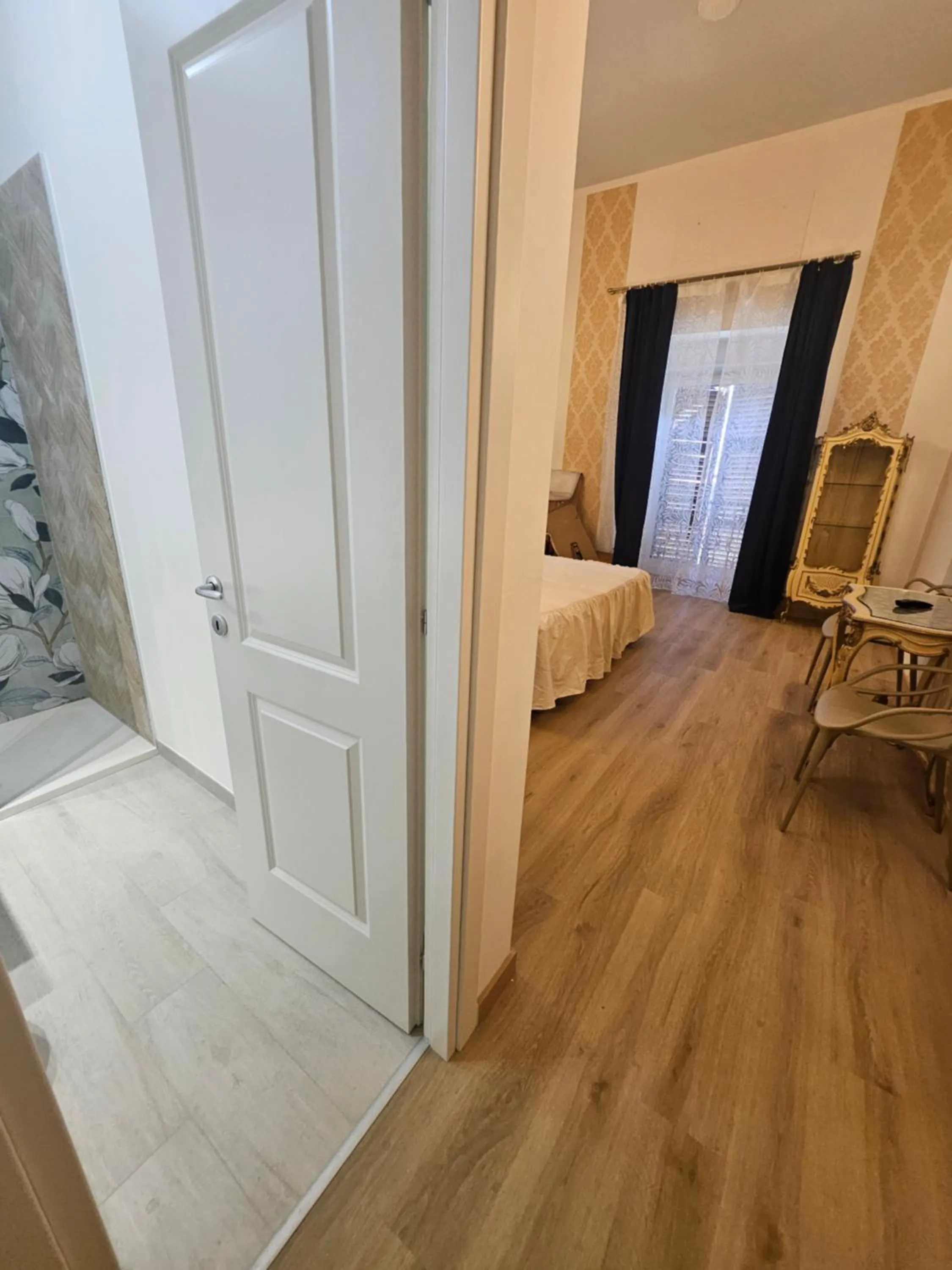 Living room, Bed in Merulana Suite Apartment