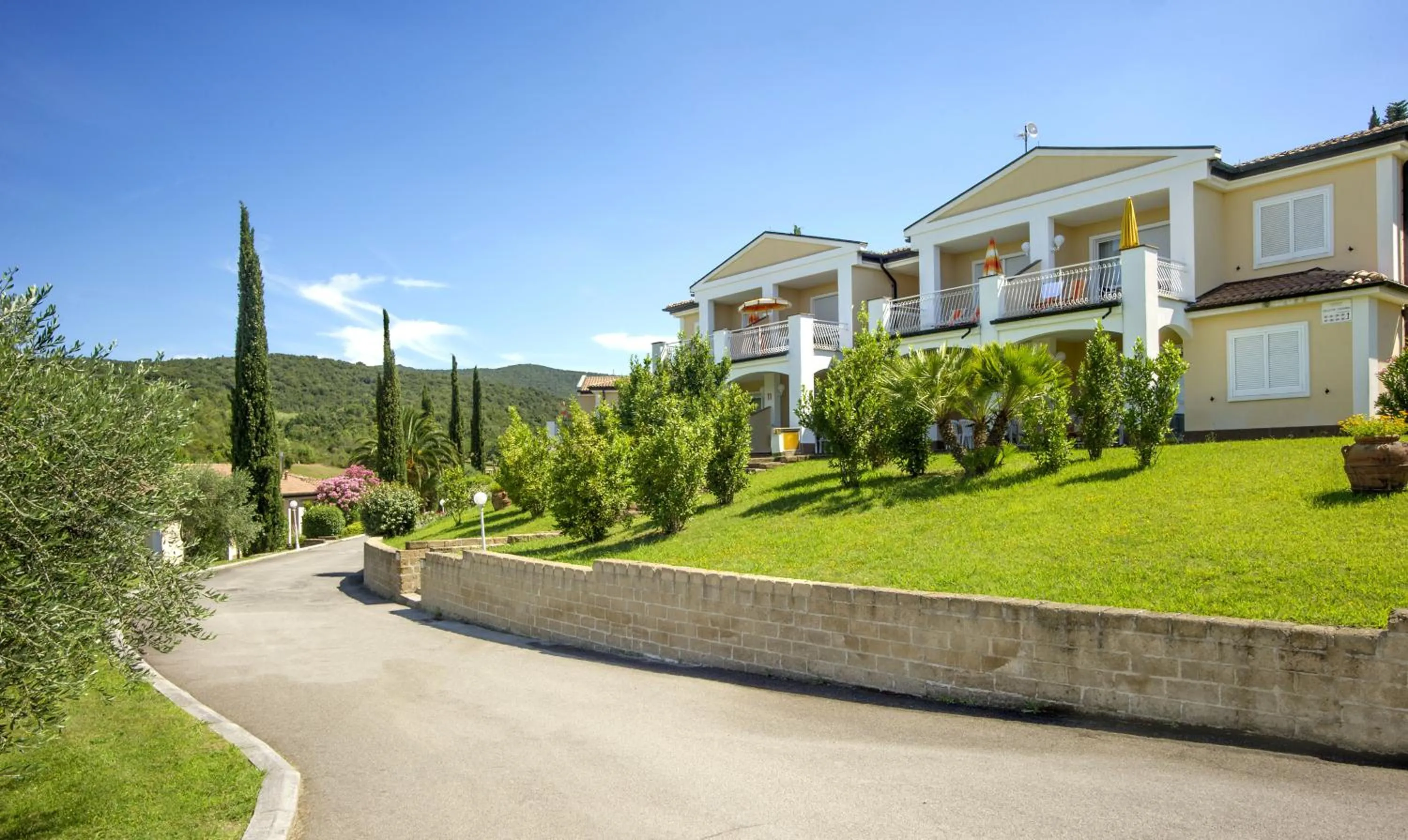 Property building in Il Pelagone Hotel & Golf Resort Toscana