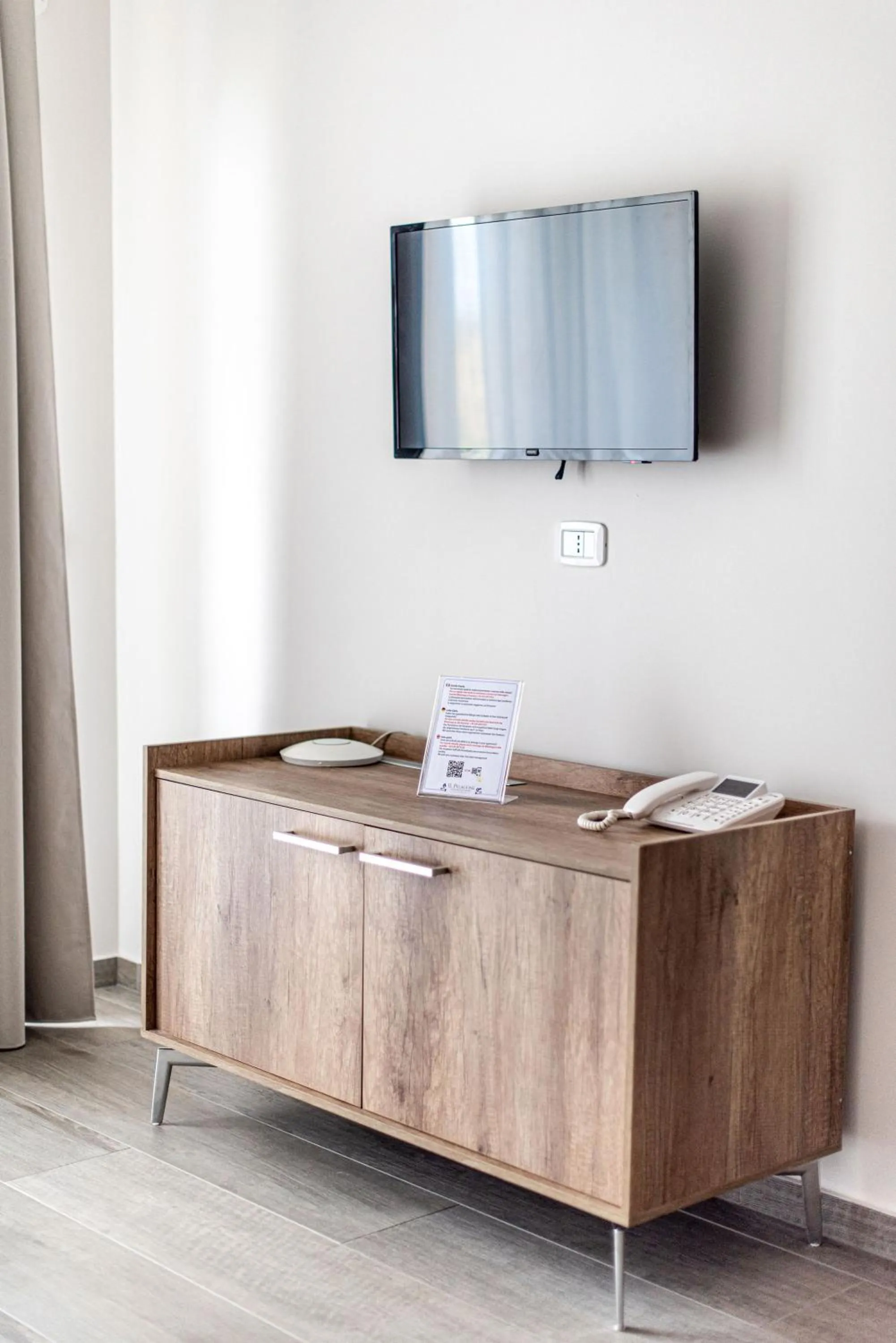 Communal lounge/ TV room in Il Pelagone Hotel & Golf Resort Toscana