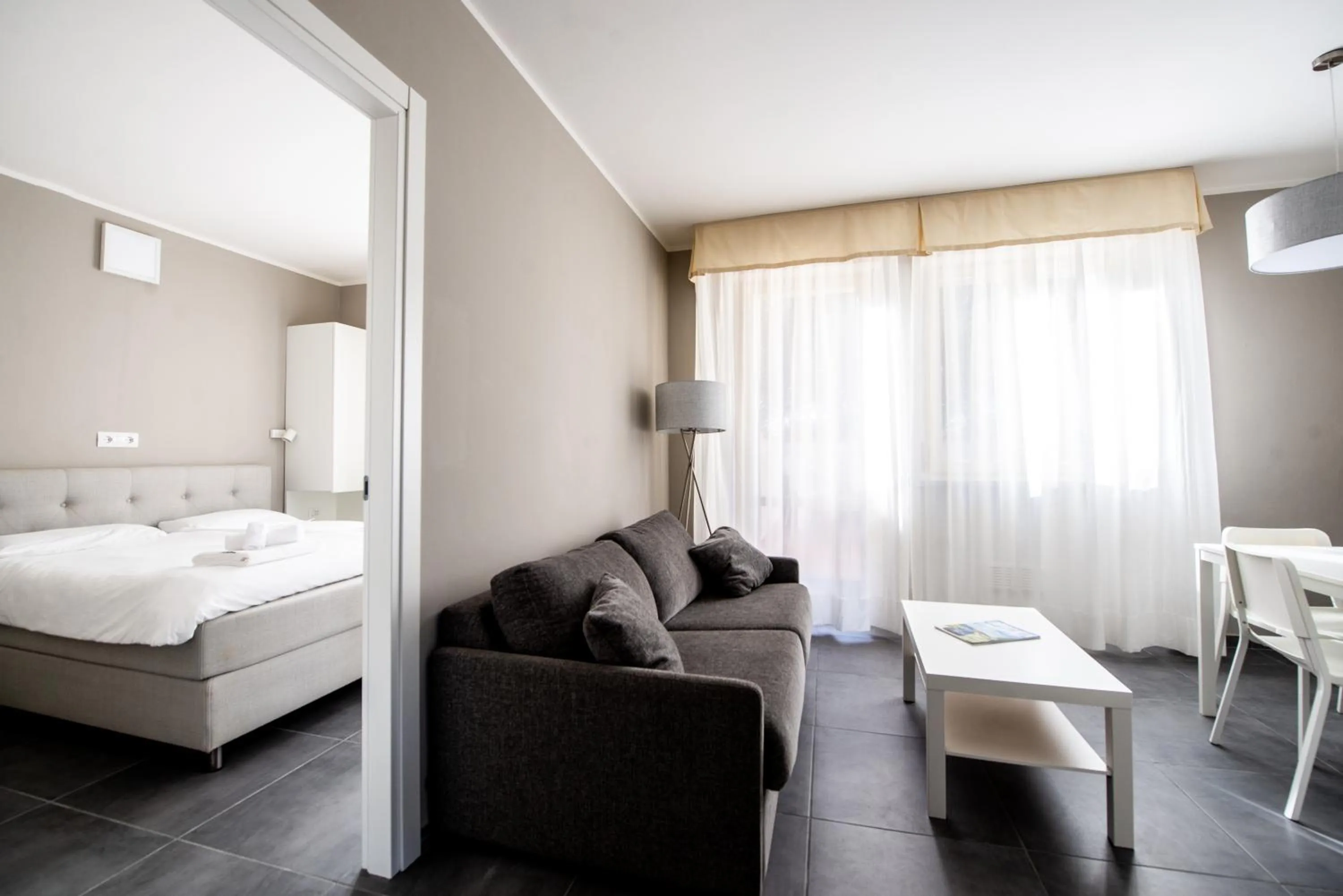 Living room, Bed in Il Pelagone Hotel & Golf Resort Toscana