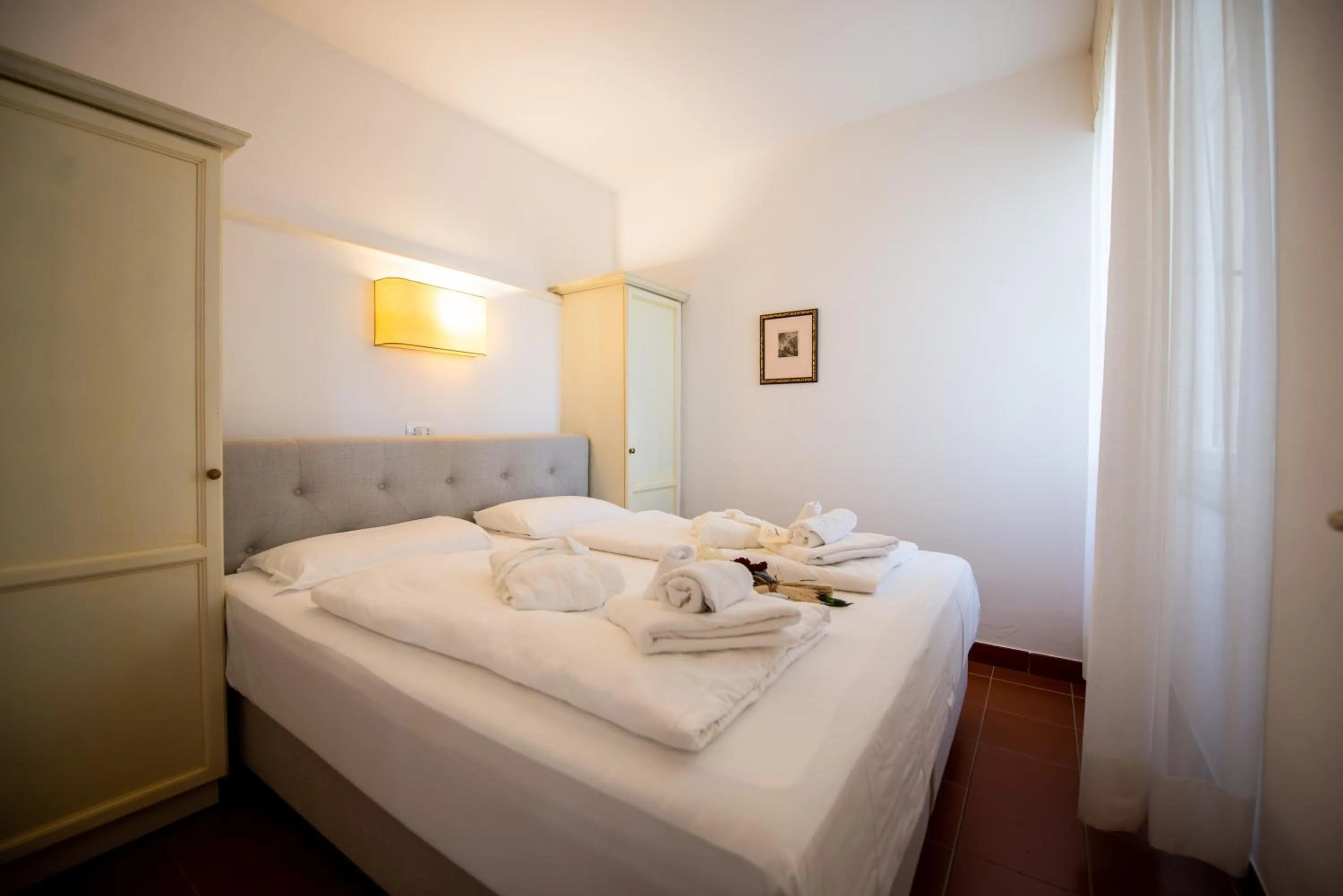 Bedroom, Bed in Il Pelagone Hotel & Golf Resort Toscana