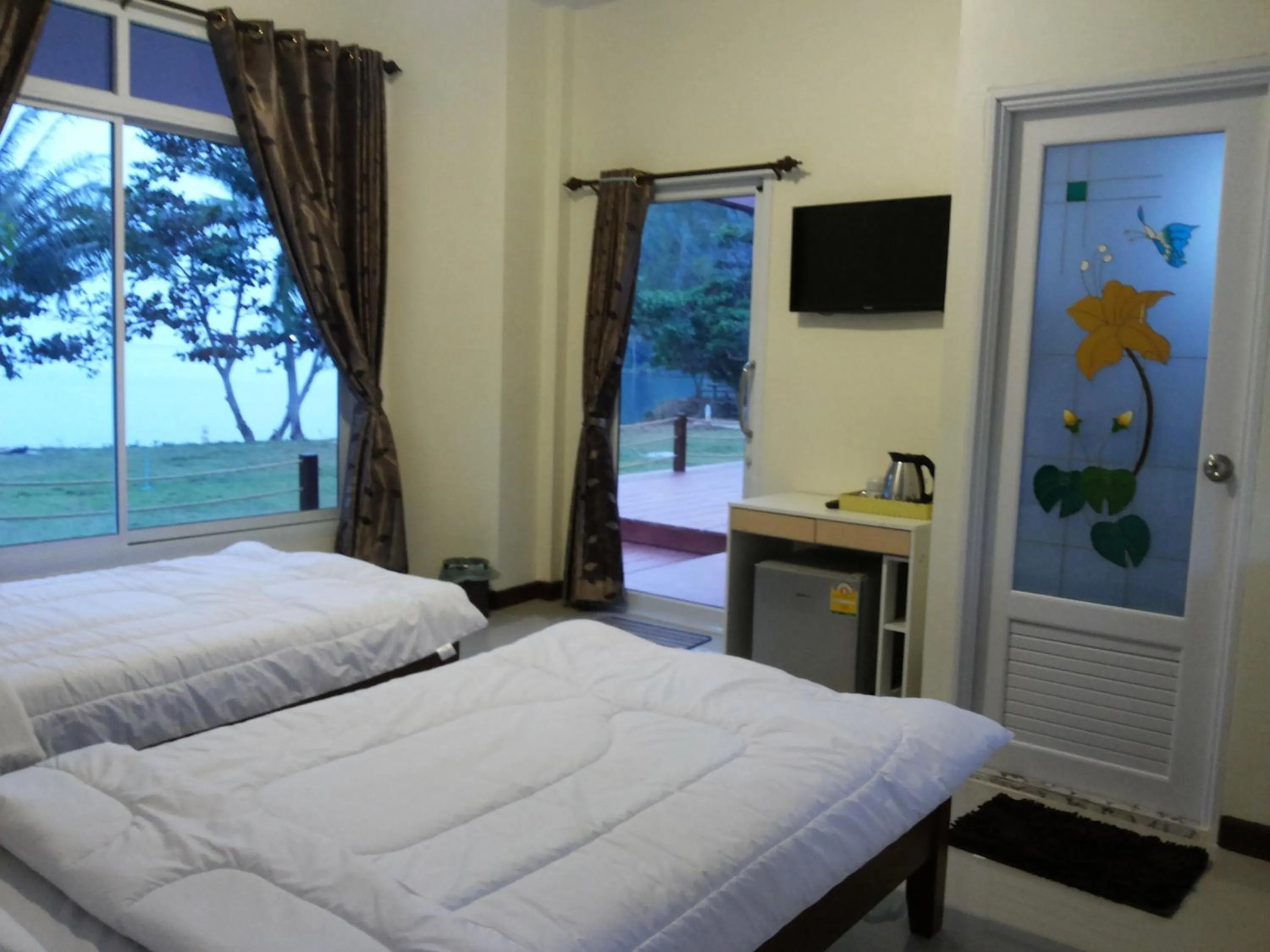 Bed in Lomtalay Resort Trat